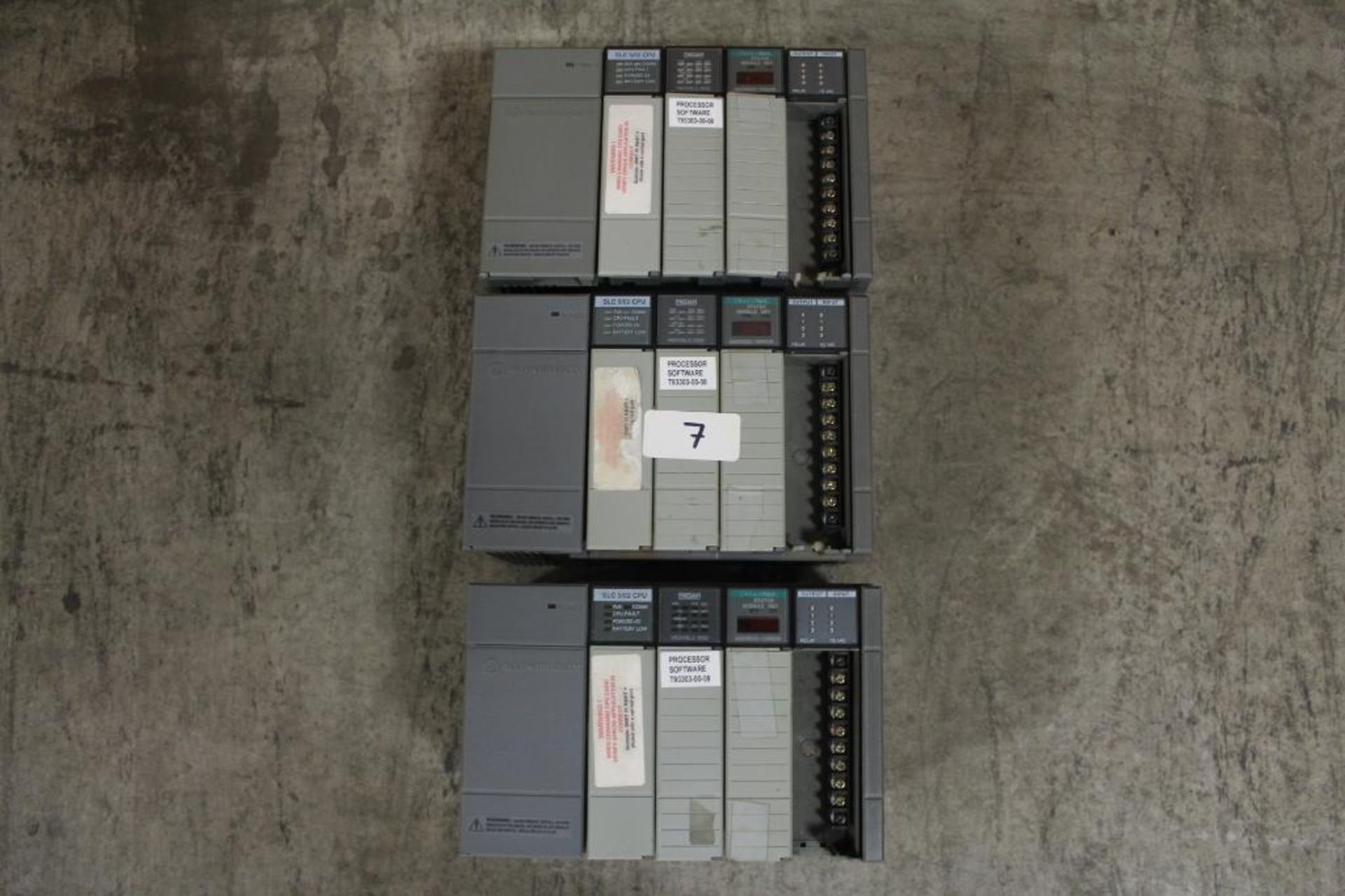 (Lot of 3) Allen-Bradley 1746-A4 Rack w/ 1746-P1 Power Supply, SLC 5/02 Processor, and Various Cards