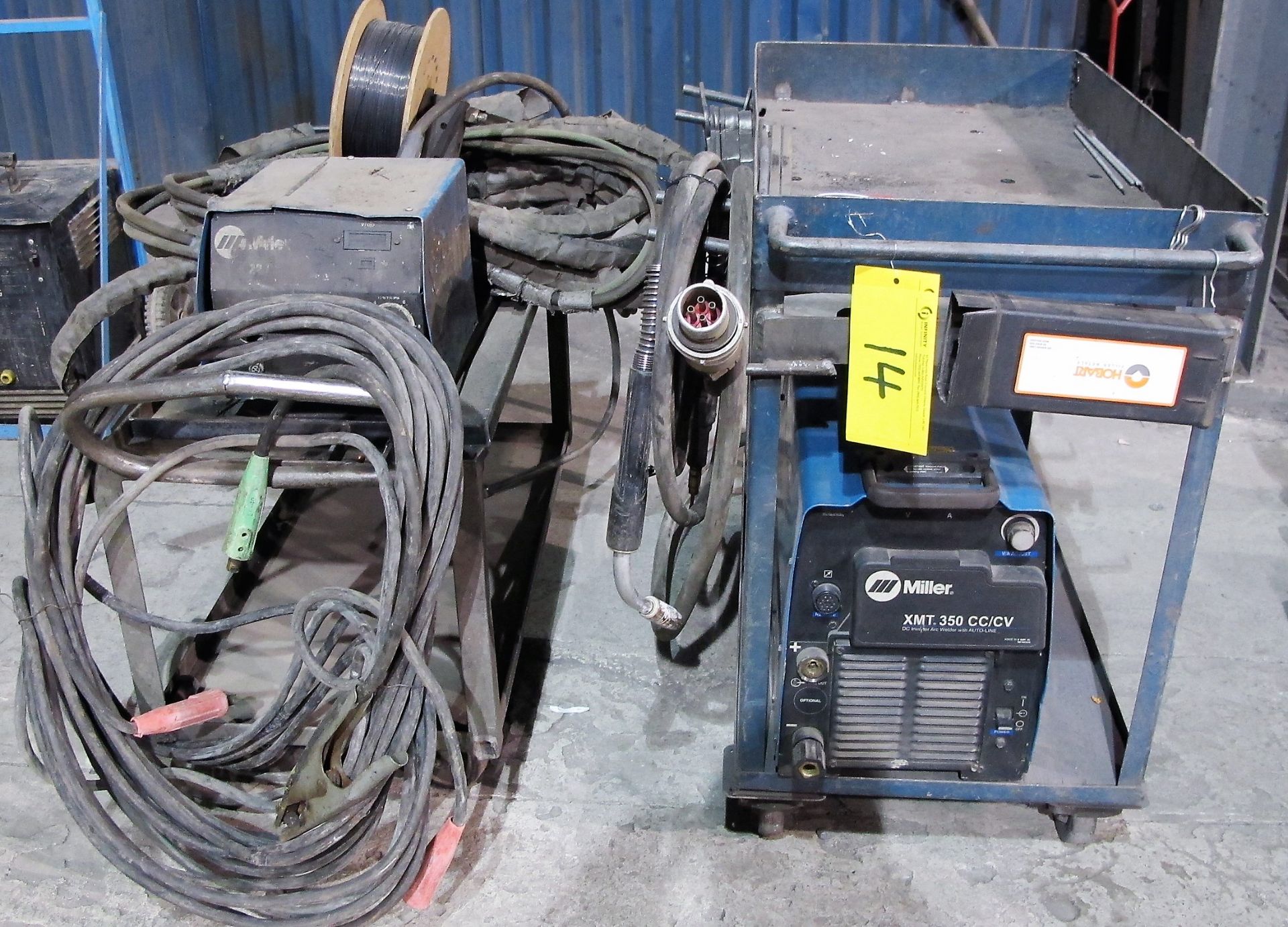 MILLER XMT 350 CC/CW WELDER, S/N LF096946 W/ MILLER 22A WIRE FEEDER, CABLES & CART