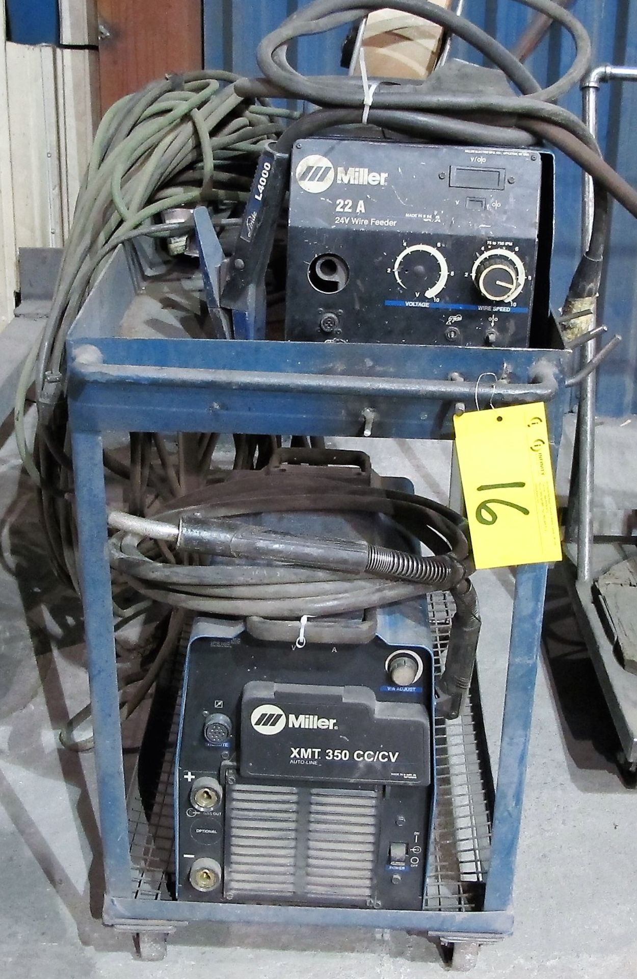 MILLER XMT 350 CC/CW WELDER, S/N LF470022A W/ MILLER 22A WIRE FEEDER, CABLES & CART