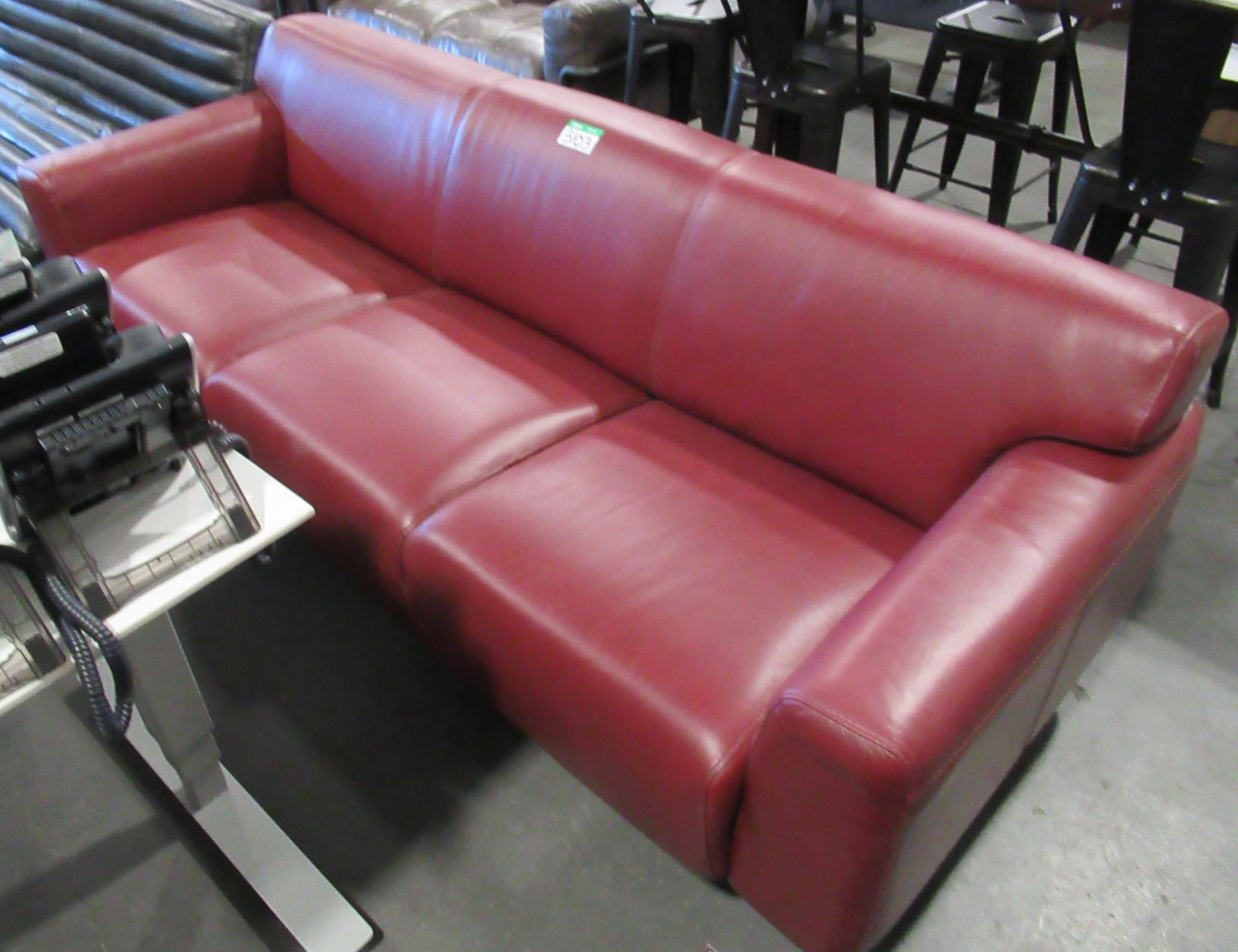 L2: MAROON LEATHER LOOKING SOFA