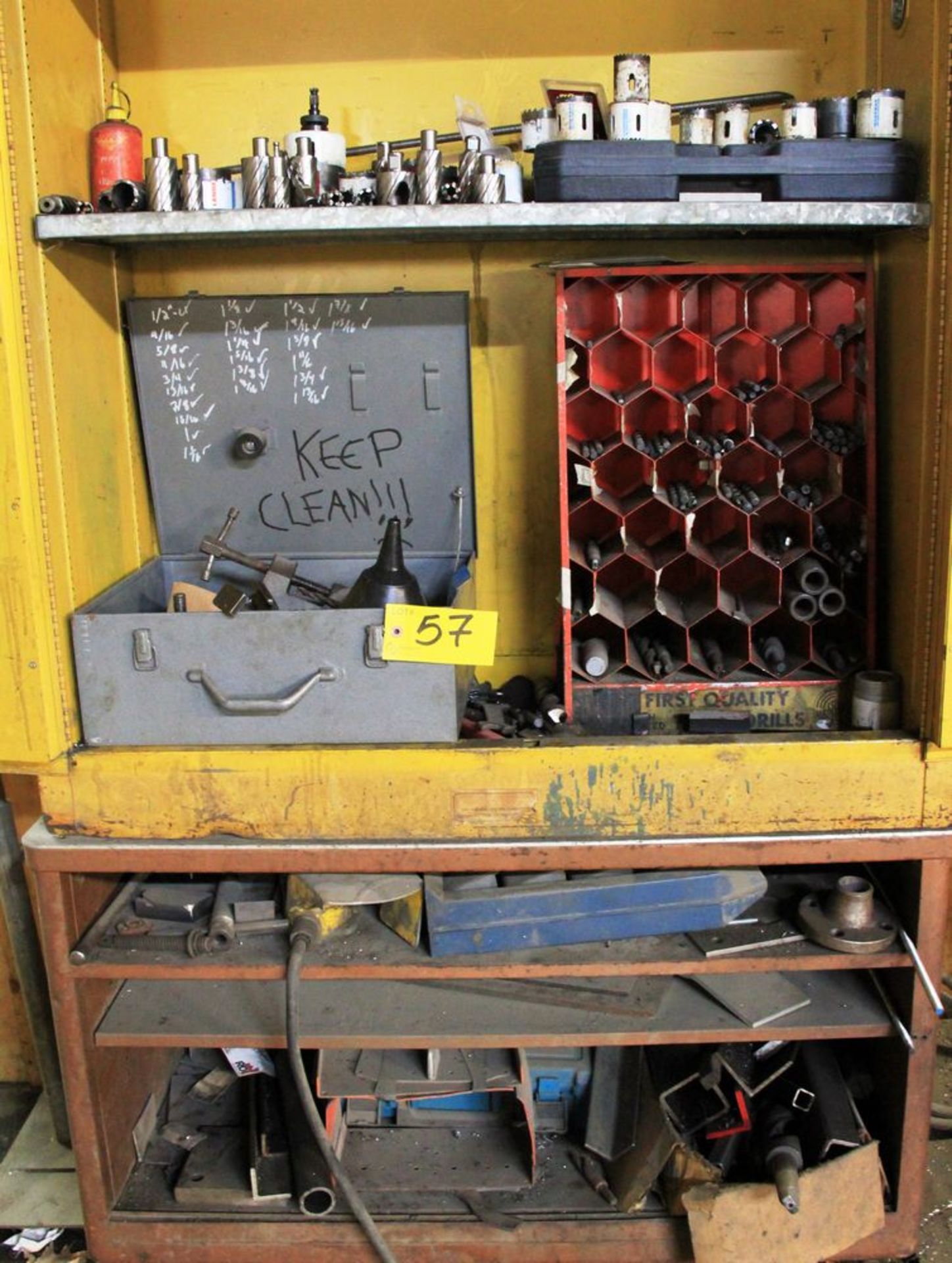 YELLOW STORAGE CABINET C/W ASSORTED MILLING CUTTERS, HOLE SAW BITS, DRILL BITS ETC