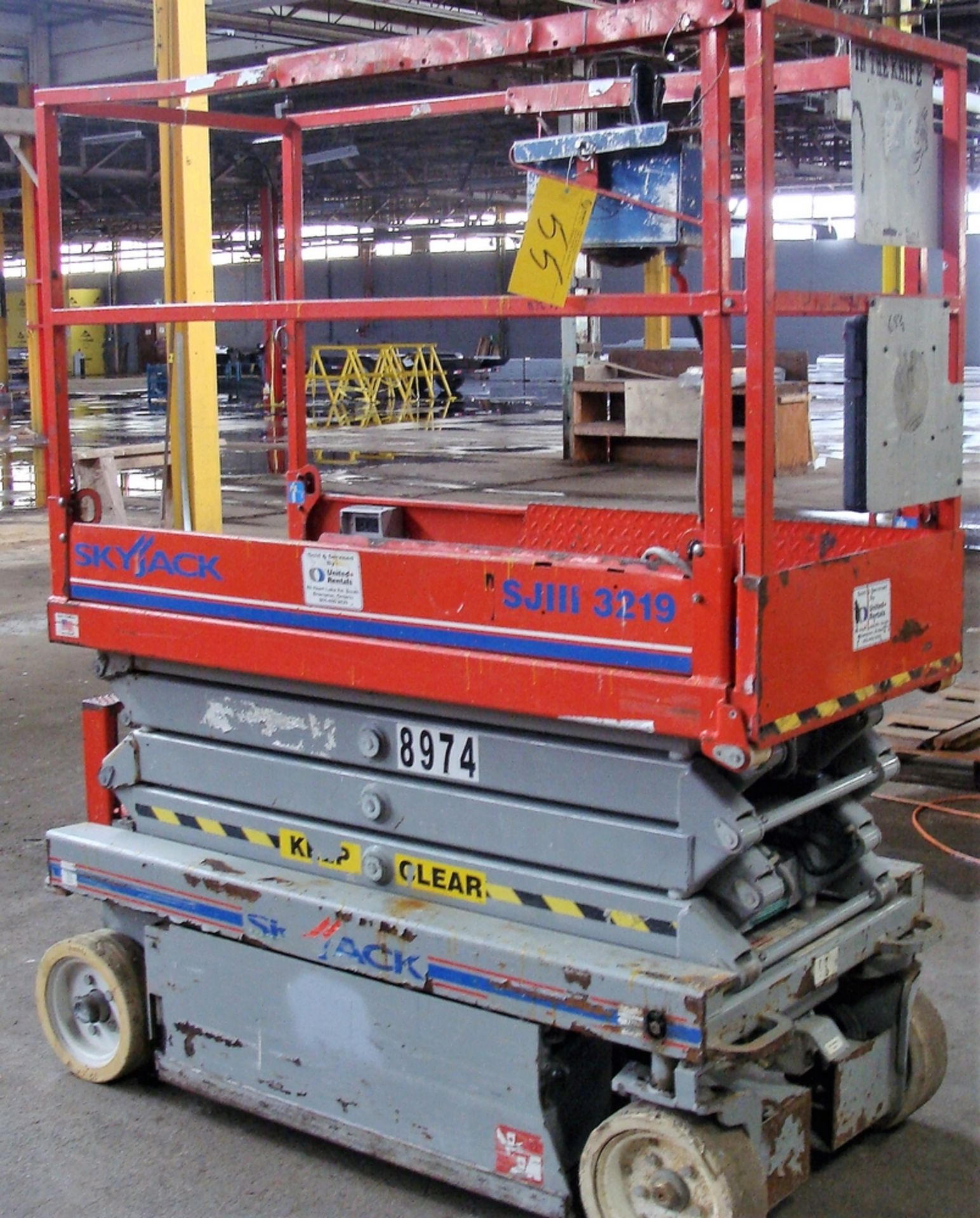 SKYJACK SJIII-3219 SCISSOR LIFT, S/N 22004574, 19' MAX PLATFORM HEIGHT, 29" X 64" PLATFORM, 550LB