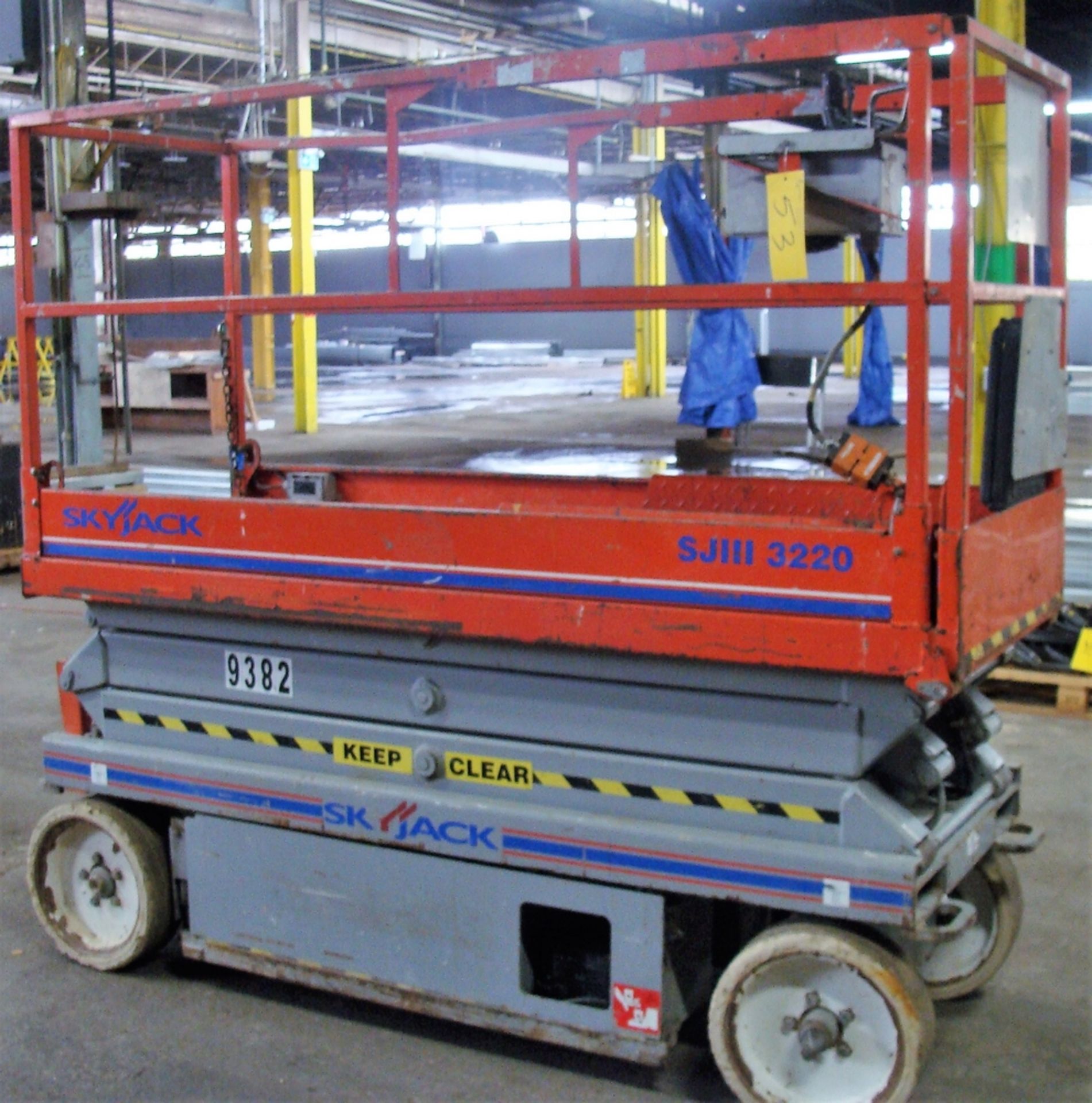 SKYJACK SJ3220 SCISSOR LIFT, S/N 60000950, 20' MAX PLATFORM HEIGHT, 32" X 86" PLATFORM, 900LB CAP.