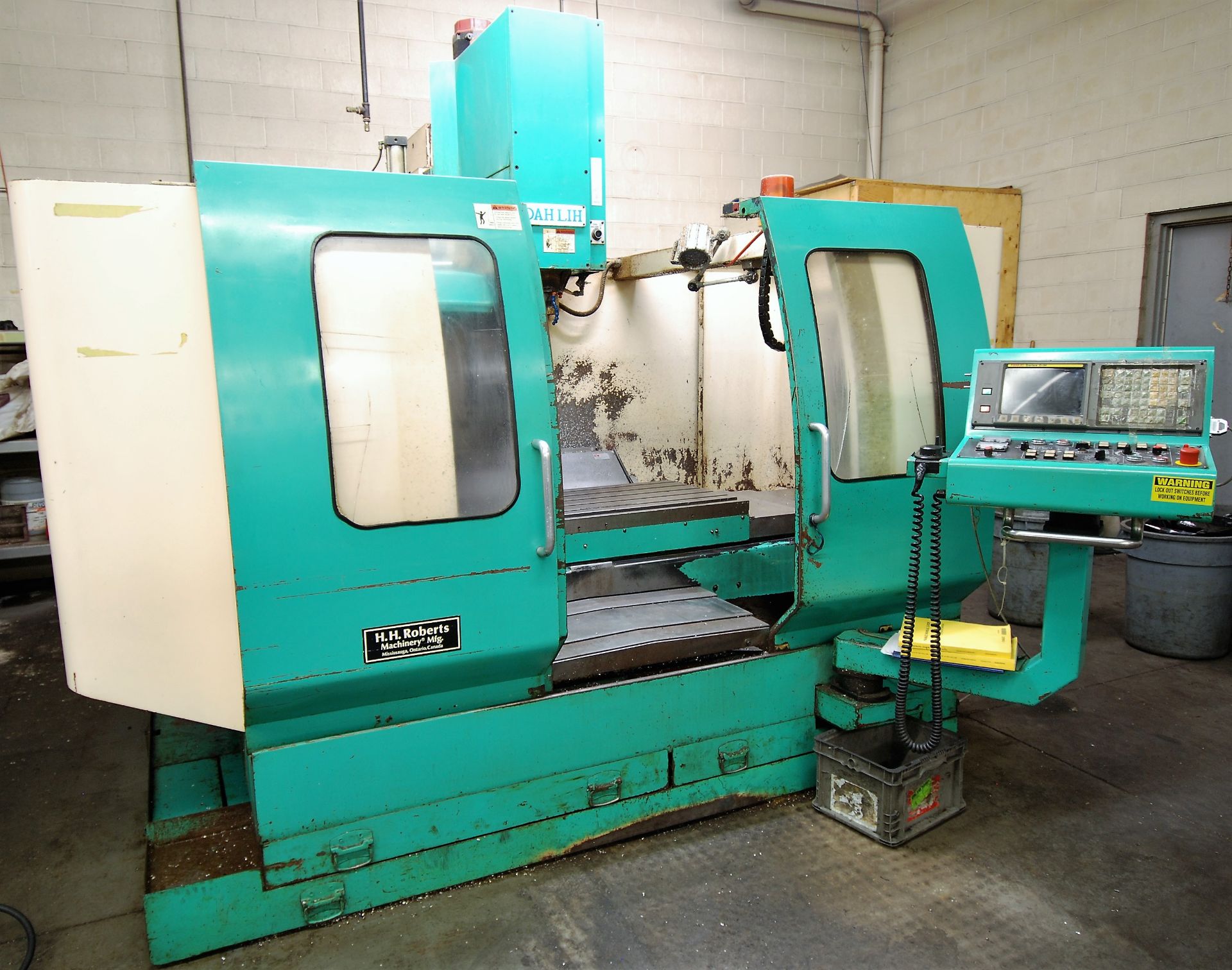 DAHLIH DL-MCV1020B CNC VERTICAL MACHINING CENTER, 23"D X 51"W TABLE, X-40" Y-20" Z-22" TRAVEL, 18KVA