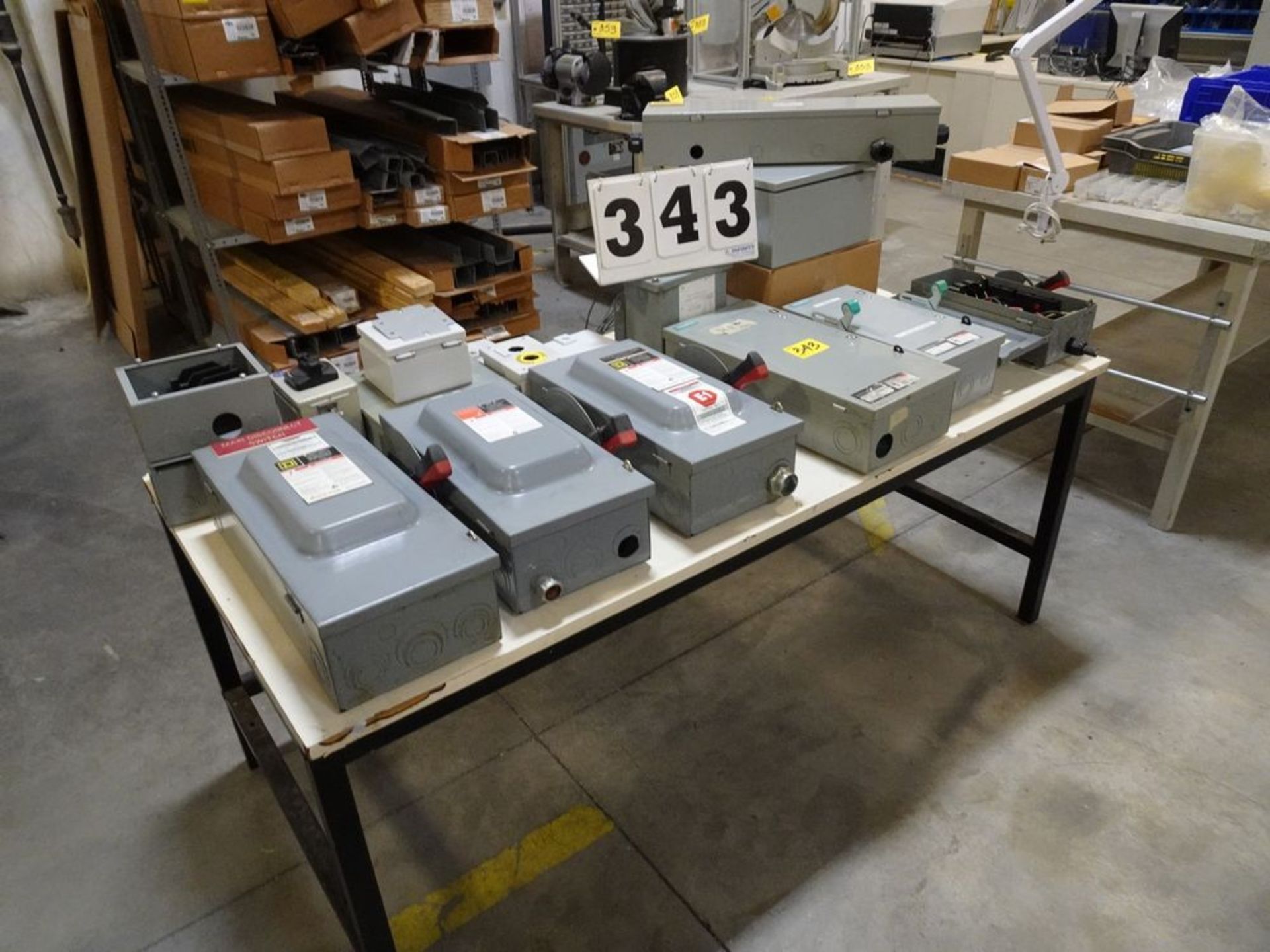 STEEL FRAMED TABLE W/ASSORTED PRODUCT, SWITCHBOXES, TRASNFORMERS, ELECTRICAL, ETC.