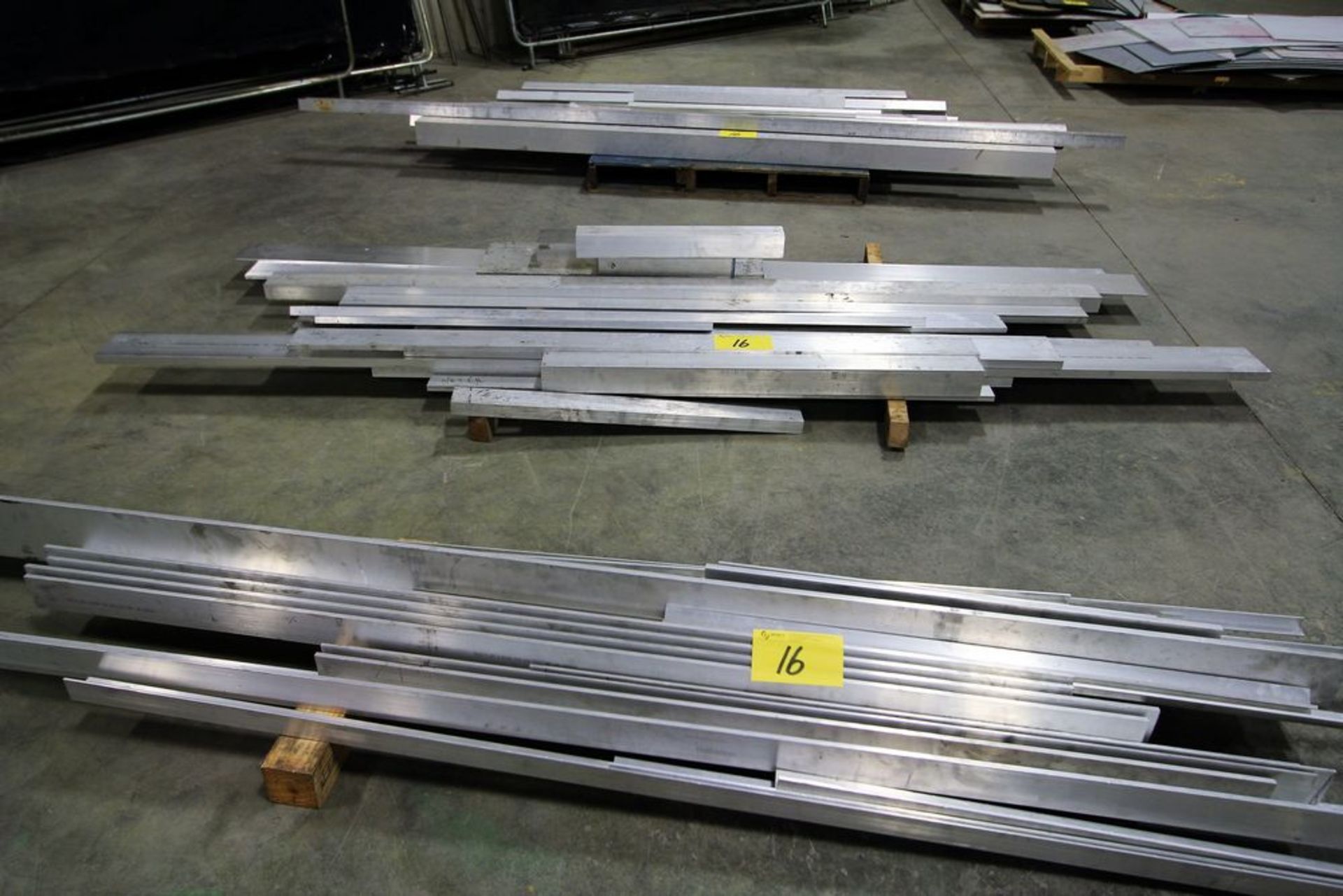 LOT OF (3) PILES OF ASSORTED ALUMINUM PRODUCT CONSISTING OF ANGLES, FLAT, SQUARE, ROUND, CHANNEL