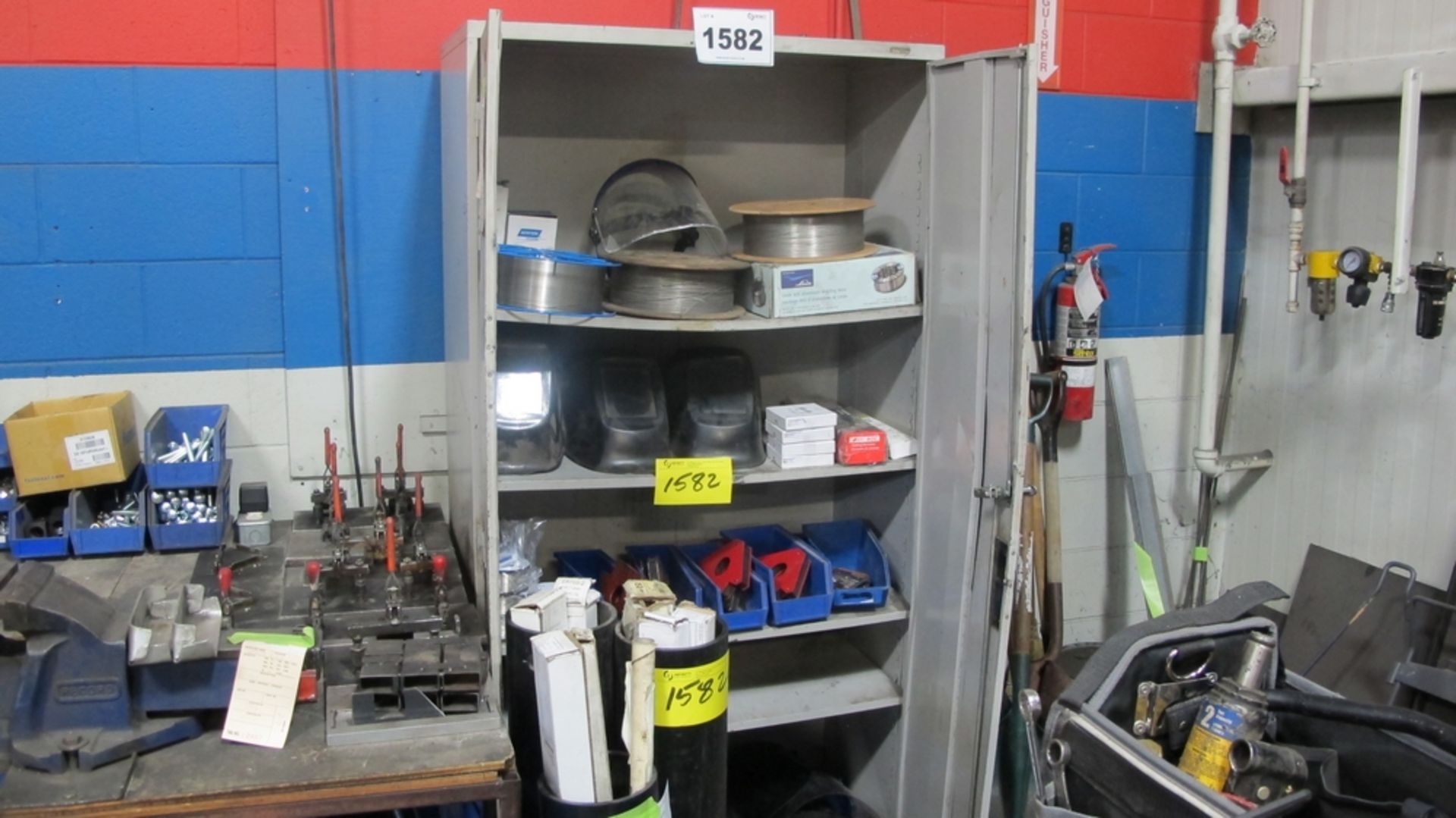 LOT OF 2 DOOR METAL CABINET W/WELDING WIRE, RODS, MASKS, ETC (100 SHIRLEY AVE KITCHENER)