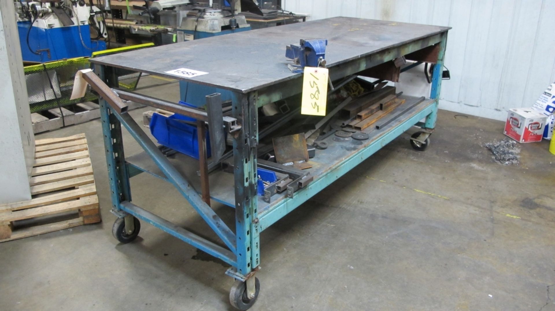 LOT OF PORTABLE WELDING TABLE W/4" VISE AND 1/2" PLATE TOP 37"W X 92"L AND METAL CONTENTS (100