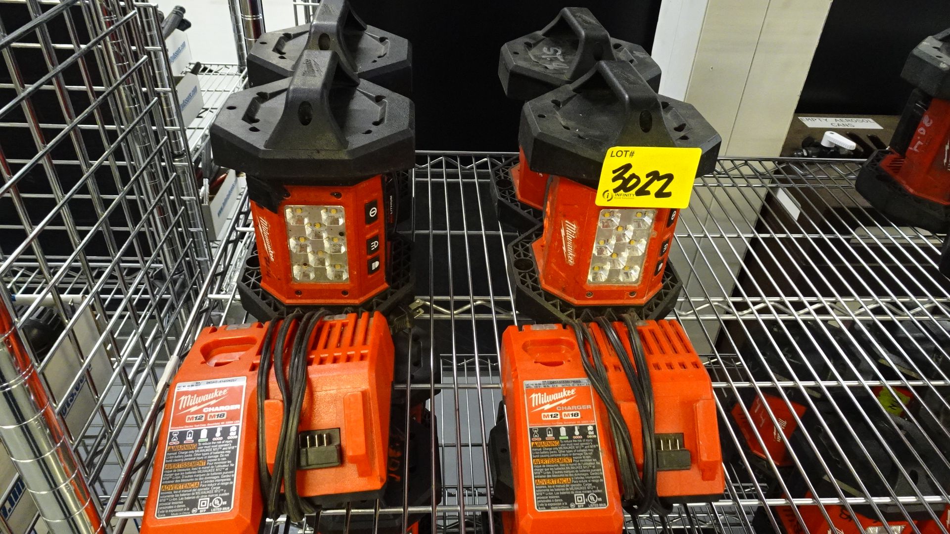 LOT (4) MILWAUKEE 18V LIGHTS W/ BATTERIES & (2) CHARGERS (REUTER)