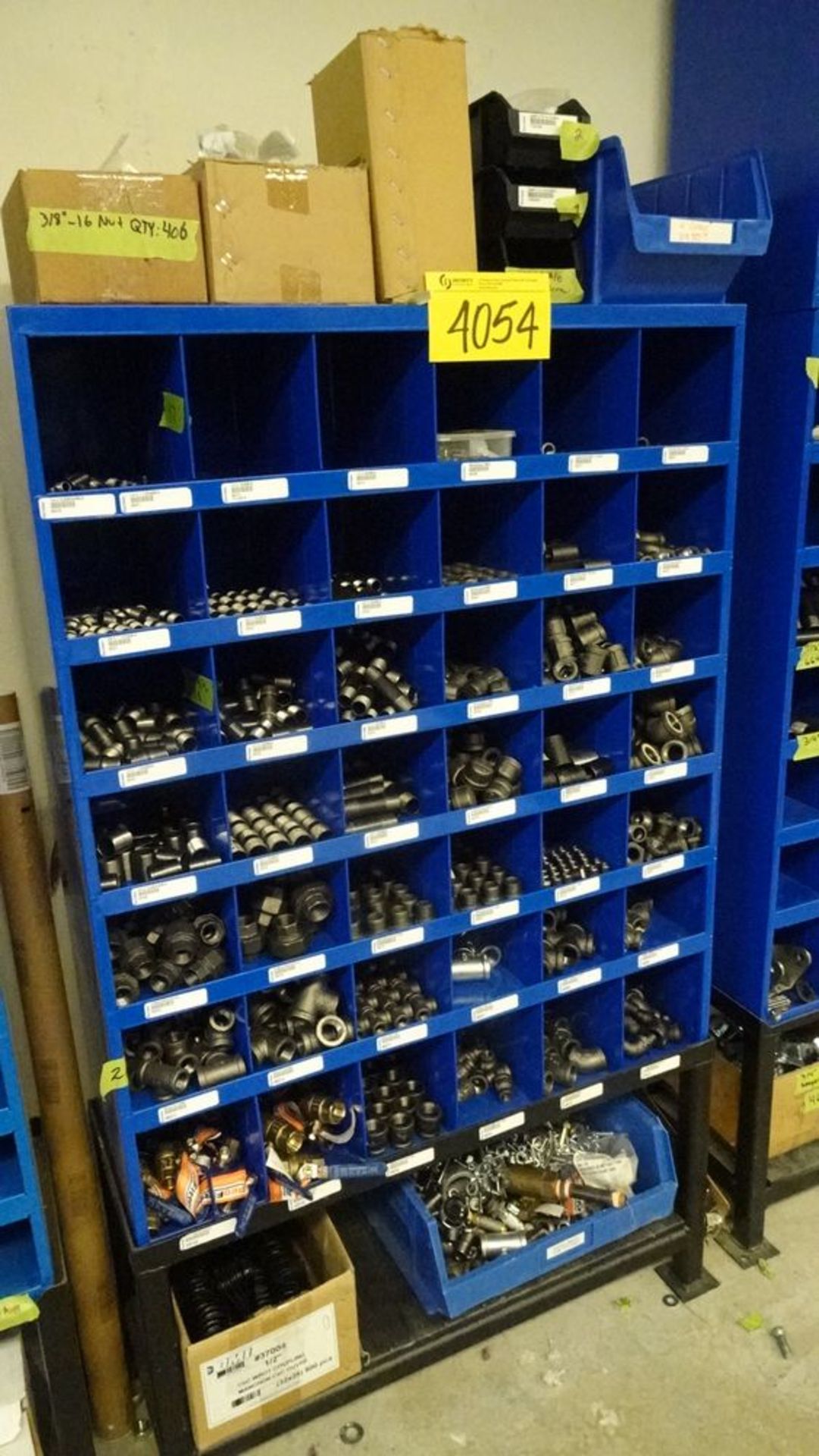 72-HOLE STORAGE CABINET W/ RACK AND CONTENTS (REUTER)