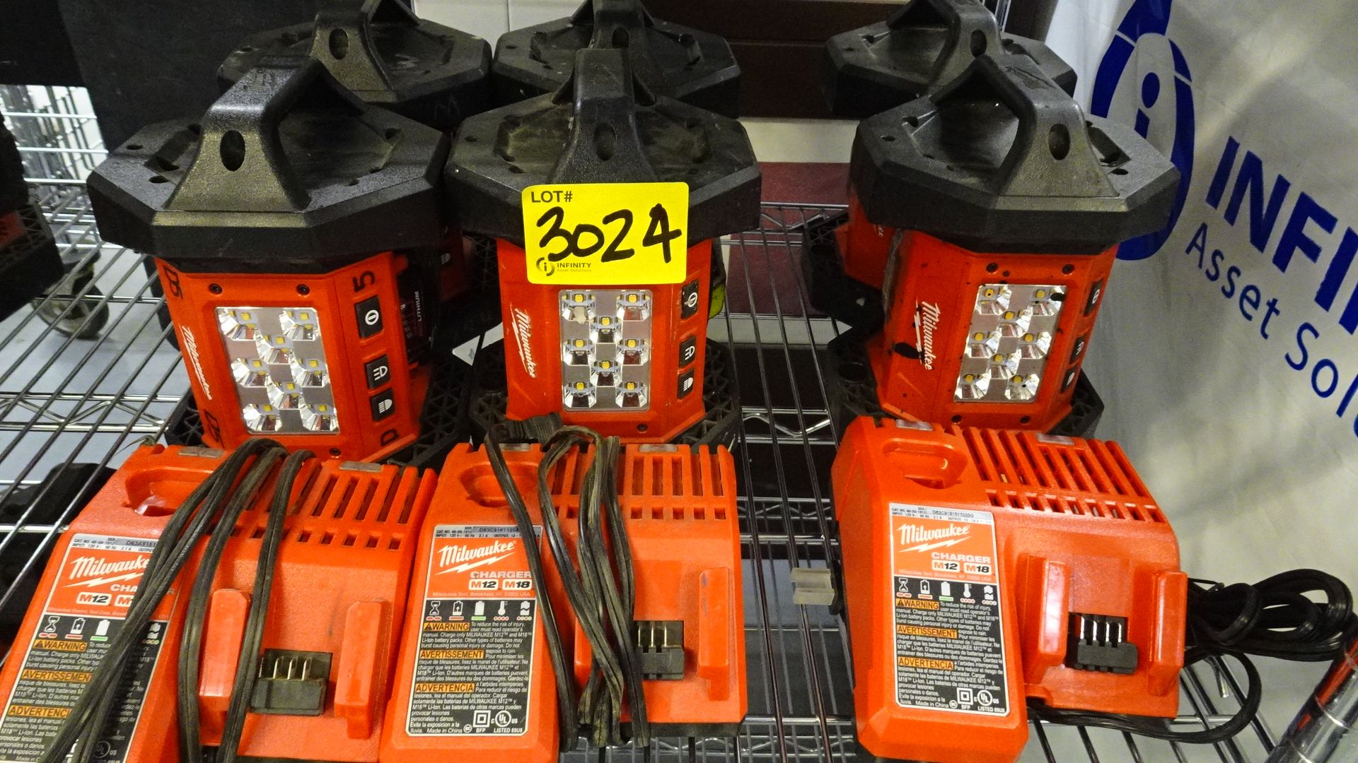 LOT (6) MILWAUKEE 18V LIGHTS W/ BATTERIES & (3) CHARGERS (REUTER)