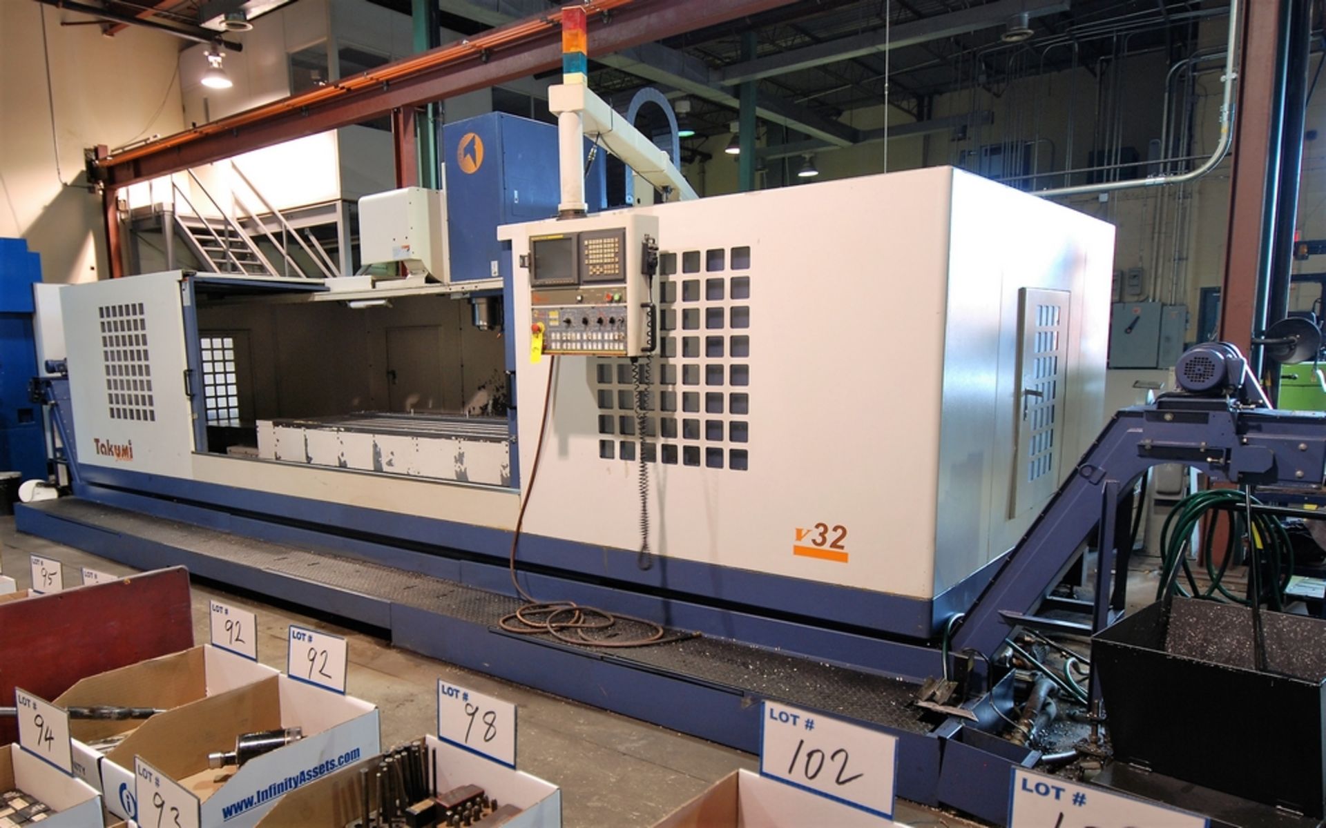 2005 TAKUMI V32 CNC VERTICAL MACHINING CENTER W/ FANUC 18I-MB CNC CONTROL, 126" X 40.3" TABLE, - Image 2 of 15