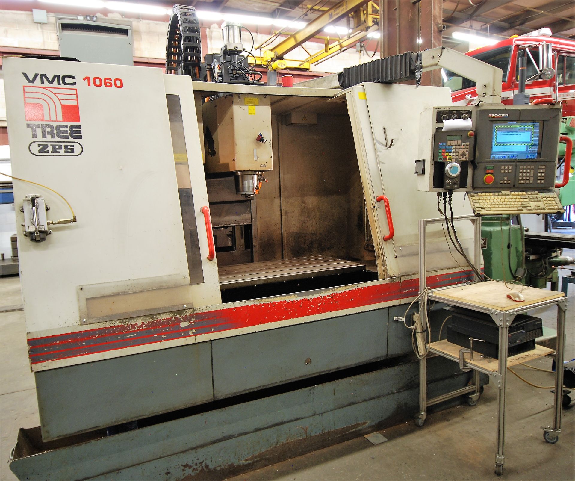 TREE VMC 1060/24 CNC VERTICAL MACHINING CENTER, S/N 912932217, PC-2100 CNC CONTROL, ATC, 23” x 50”