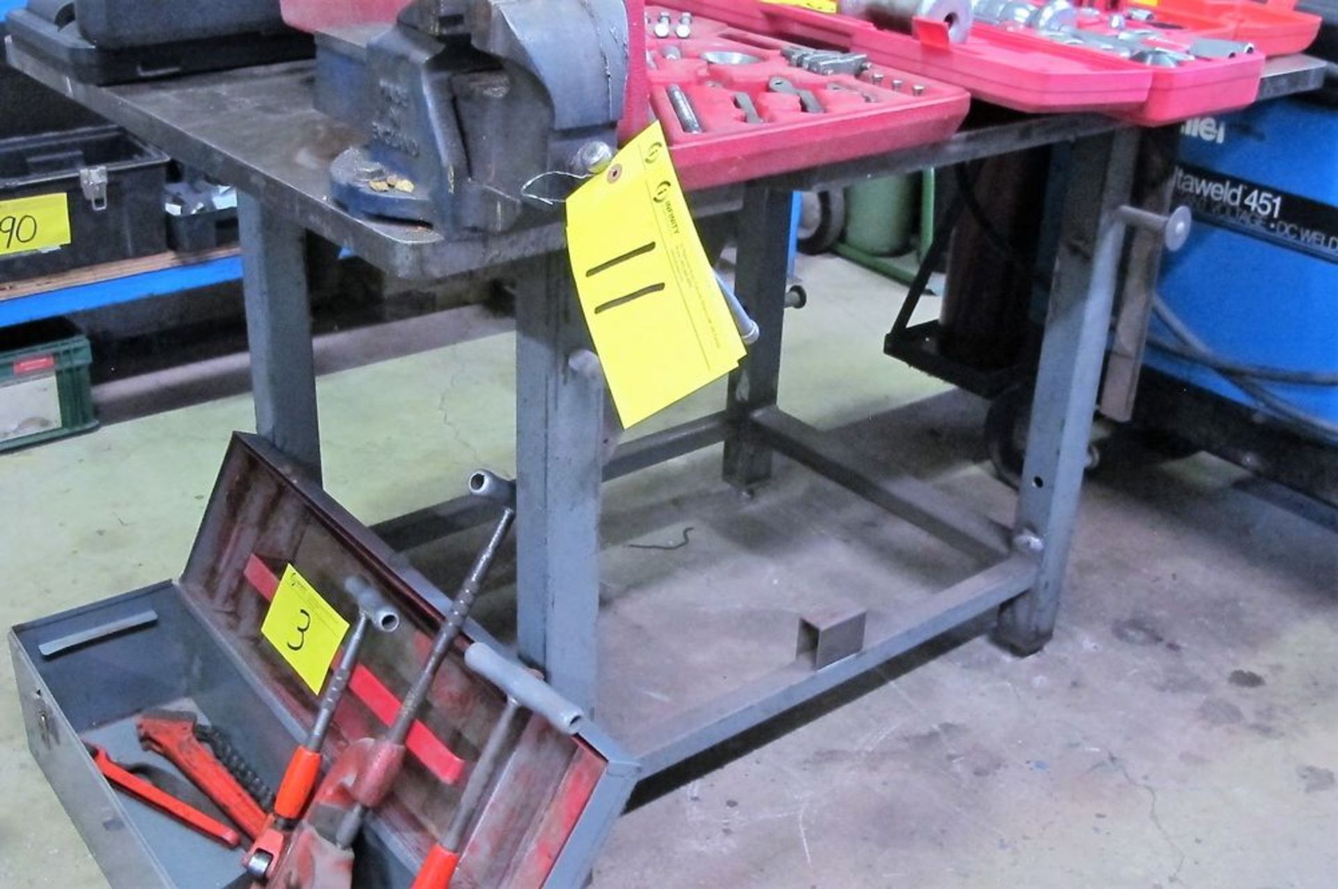 APPROX. 36" X 53" WELDING TABLE, 1" THICK PLATE TOP AND 4-1/2" VISE (NO CONTENTS)