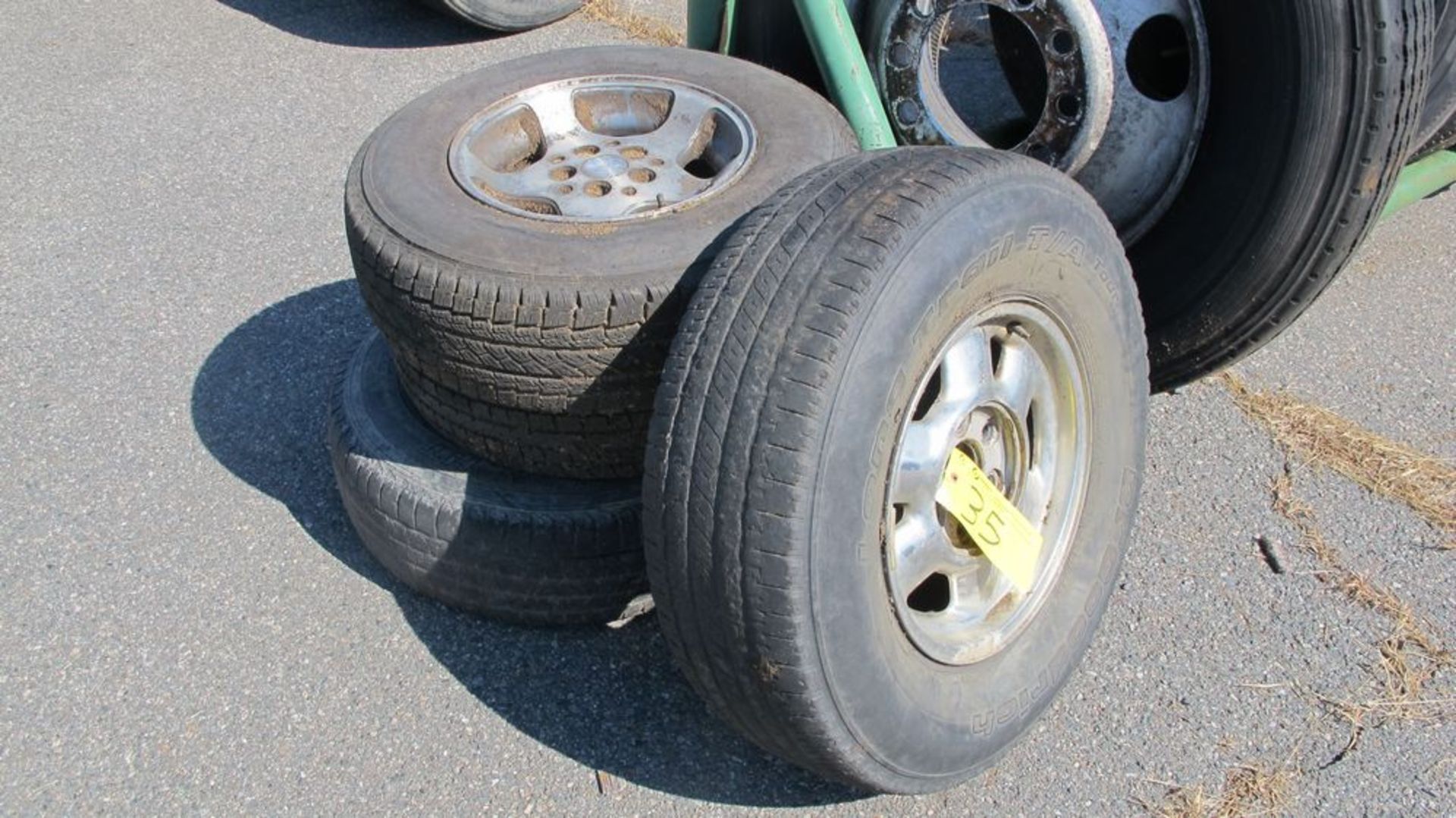 LOT OF 4 P265/75R16 TRUCK TIRES W/RIMS (WAREHOUSE 30 - PARKING LOT)