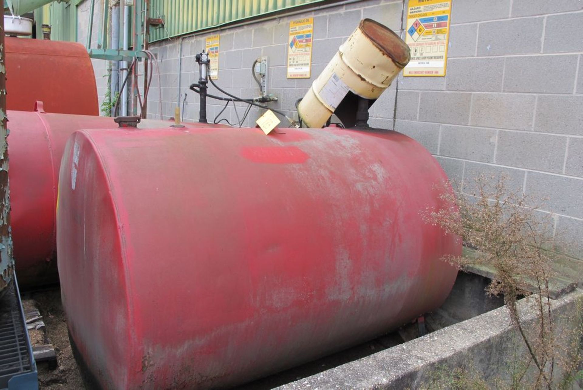 MOTOR OIL TANK W/PUMP (WOOD BLDG 29 - NORTH WALL OUTSIDE)