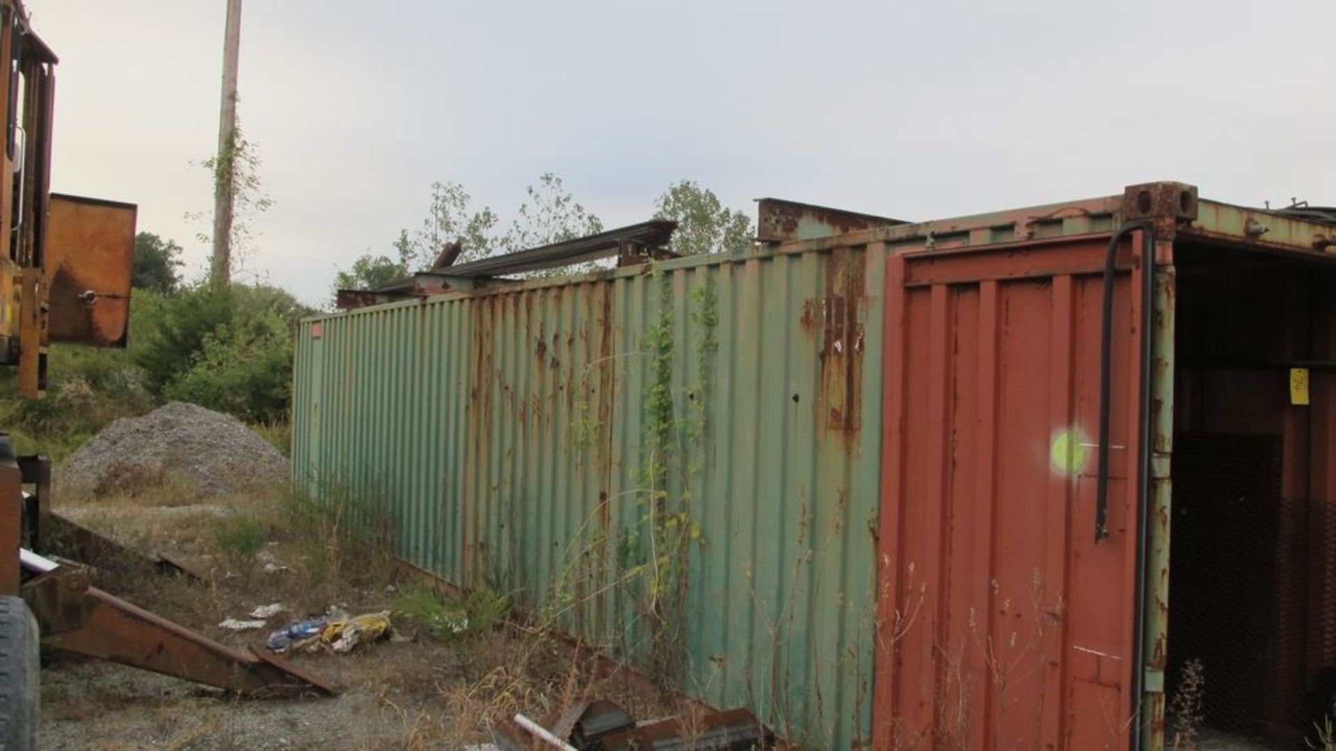 40' STORAGE CONTAINER (W/PART CONTENTS FOR DEBARKING LINE, SHED, PARTS AND STEEL IN AREA AROUND - Image 2 of 15