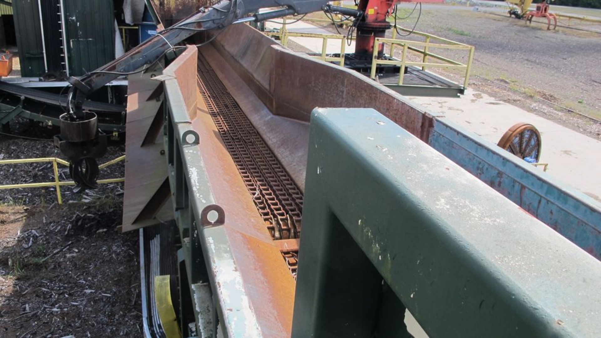 4 CHAIN LOG TRANSFER CONVEYOR (APPROX 70'L) AND 40 HP DRIVE W/CHAIN DEBRIS CONVEYOR BELOW FEEDING - Image 4 of 5