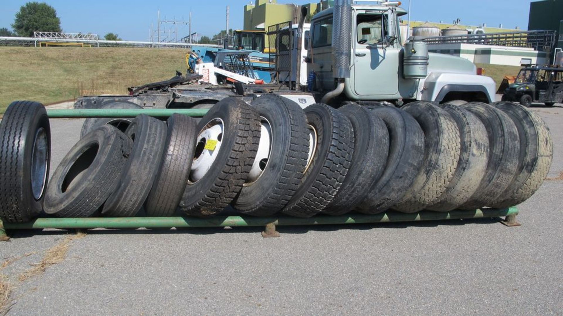 16' L TRANSPORT TIRE STORAGE RACK W/13 TRANSPORT TIRES (USED - NEW) (WAREHOUSE 30 - PARKING LOT) - Image 2 of 2