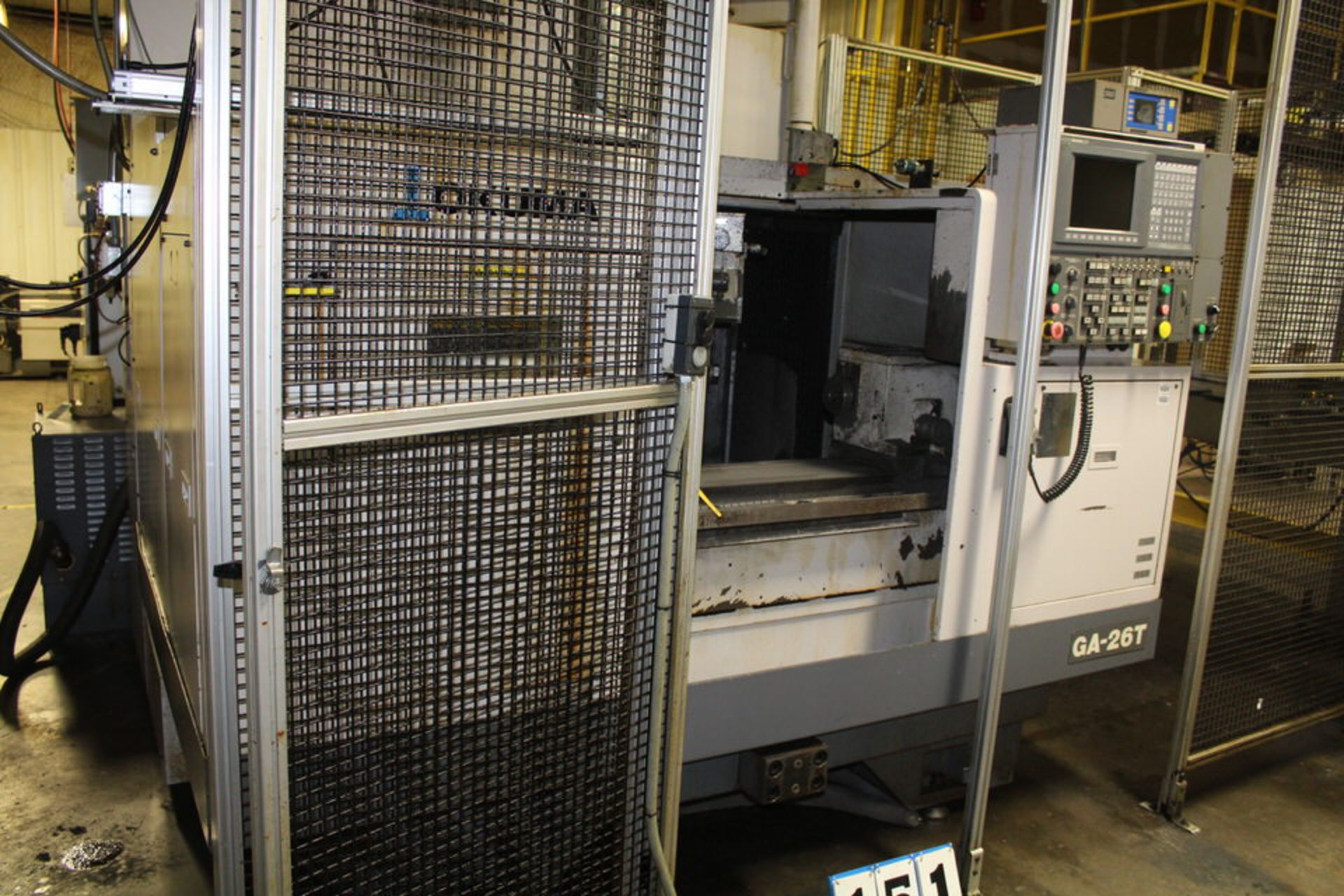 2006 OKUMA GA-26T CNC GRINDER W/ OKUMA OSP-U10G CTRL, 3" SPINDLE, 24" GRINDING WHEEL