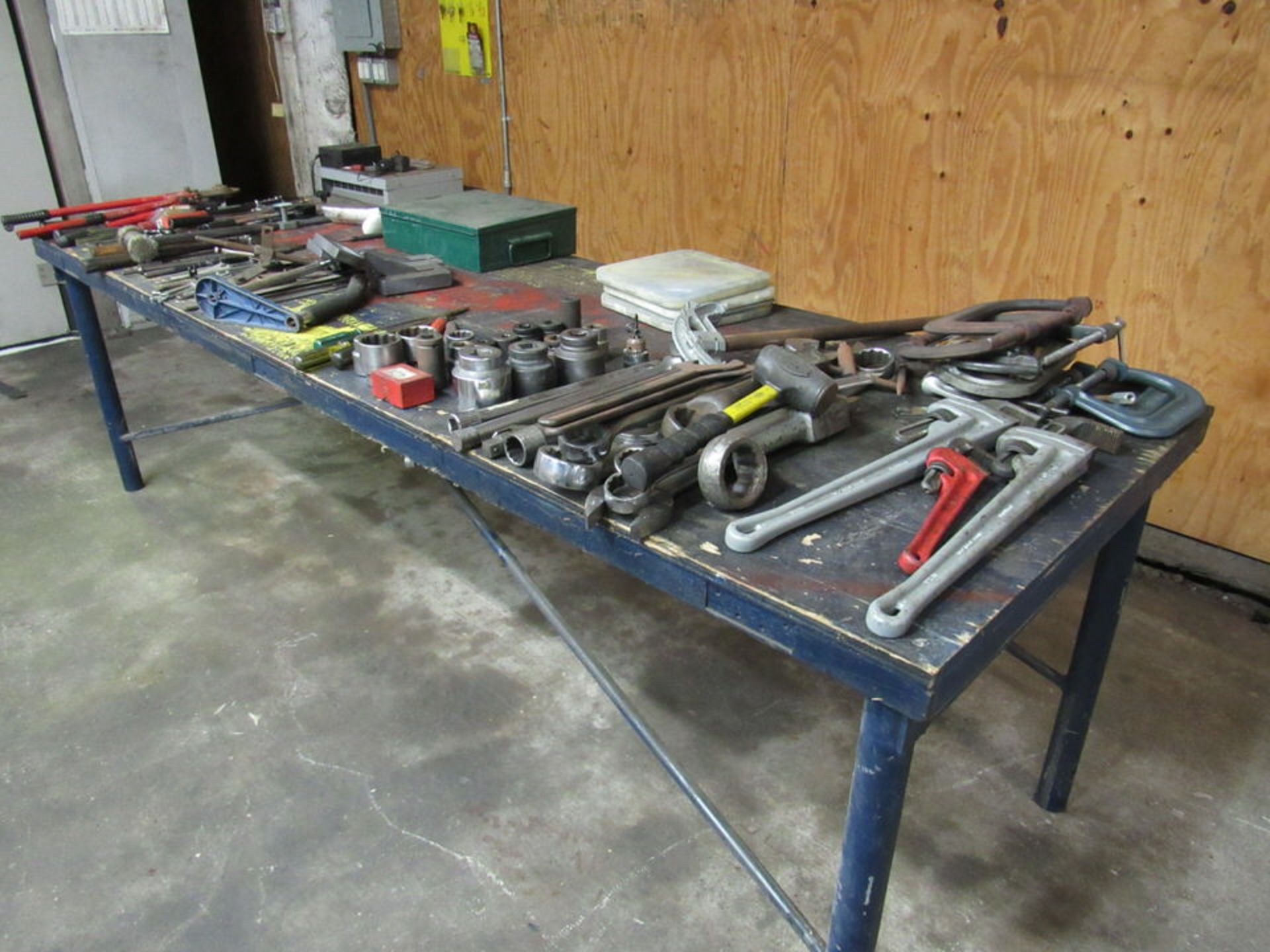 Table with Contents Tools Clamps Etc