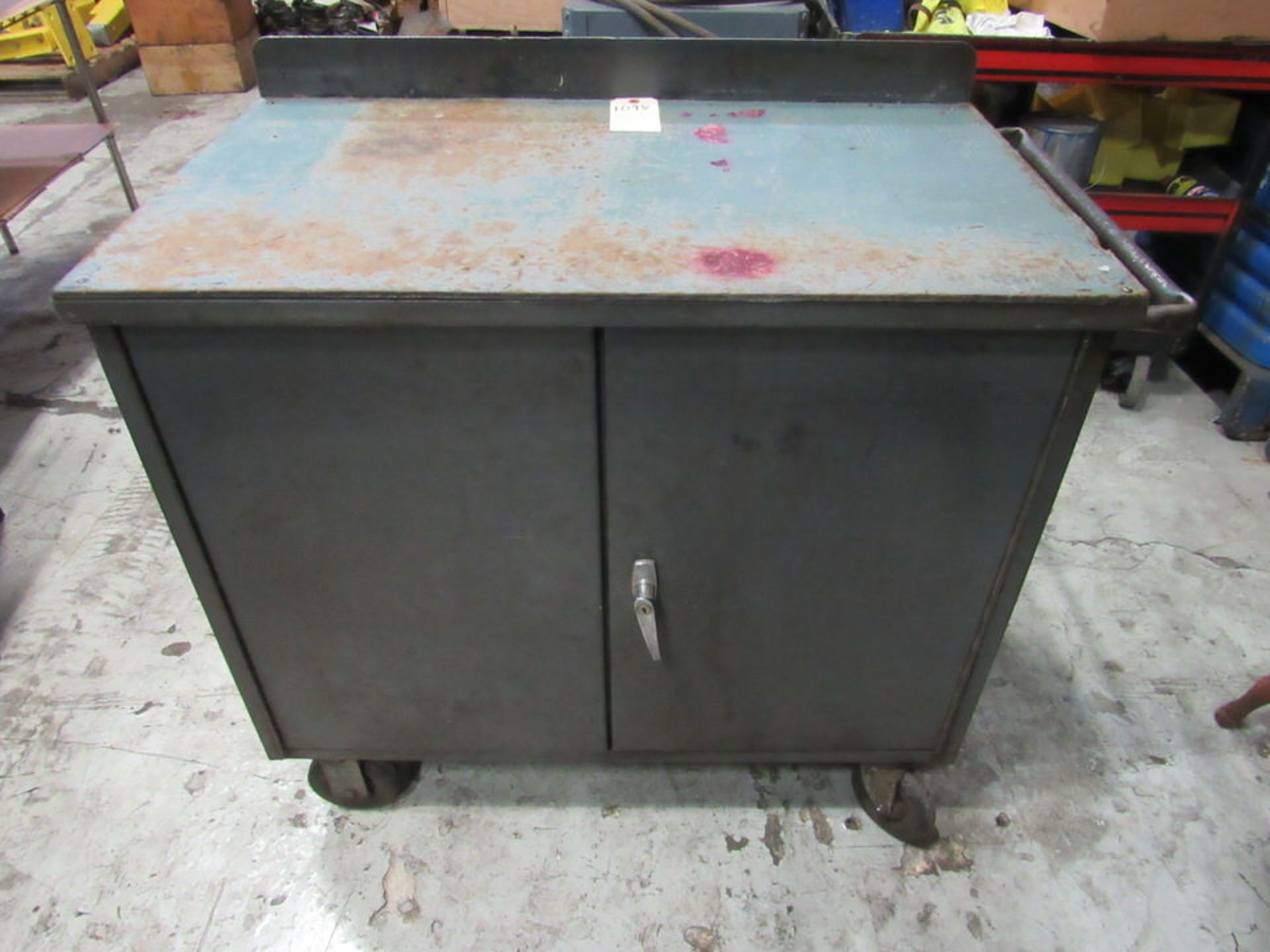 2 Door Rolling Cabinet with Contents (LOCATION: 3603 Melva Street, Houston TX 77020)