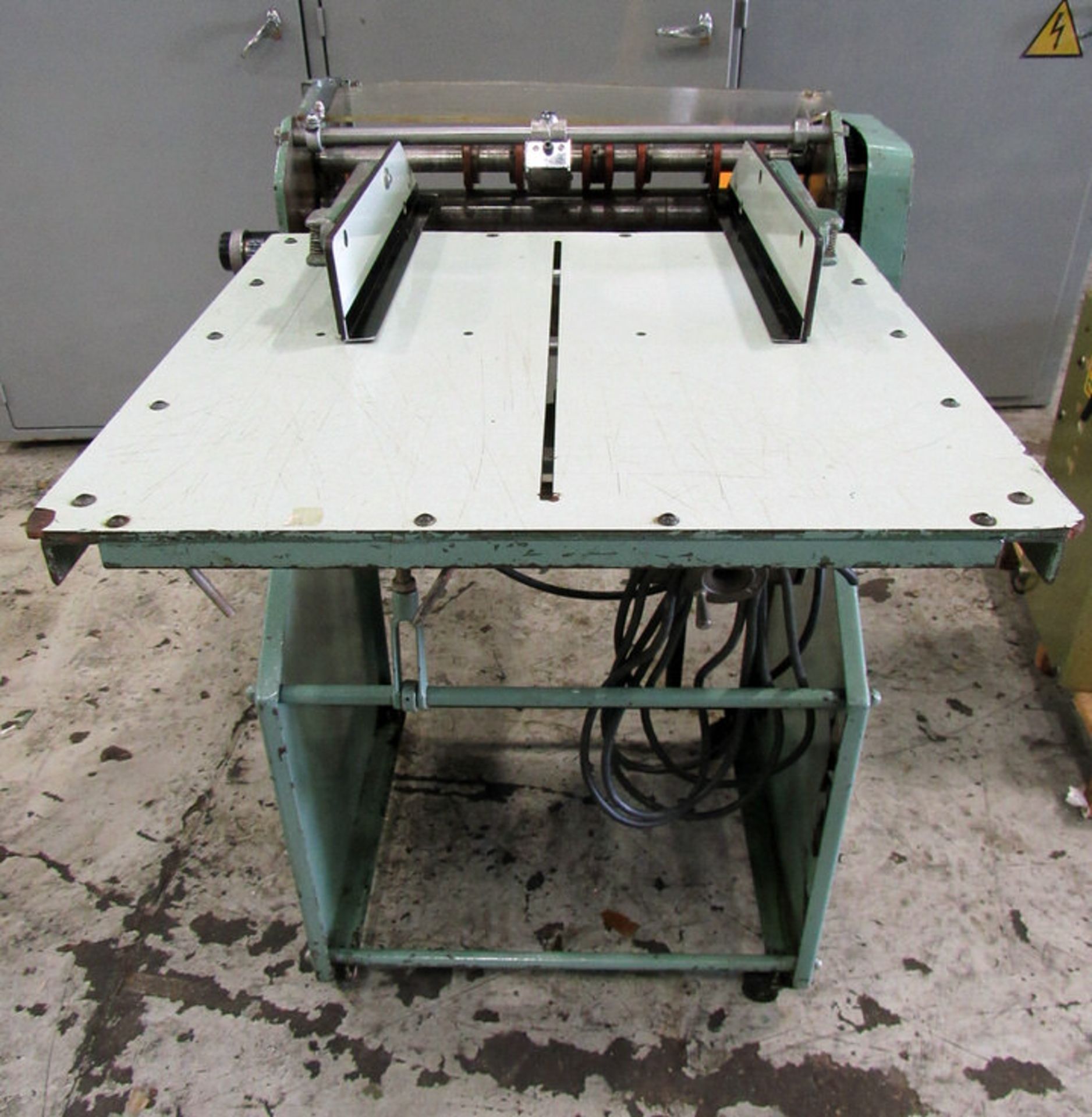 17" Slitter (Paper and Plastic Film), 17" max. width, 7 cutting wheels, 22.75" W x 22.5" D infeed