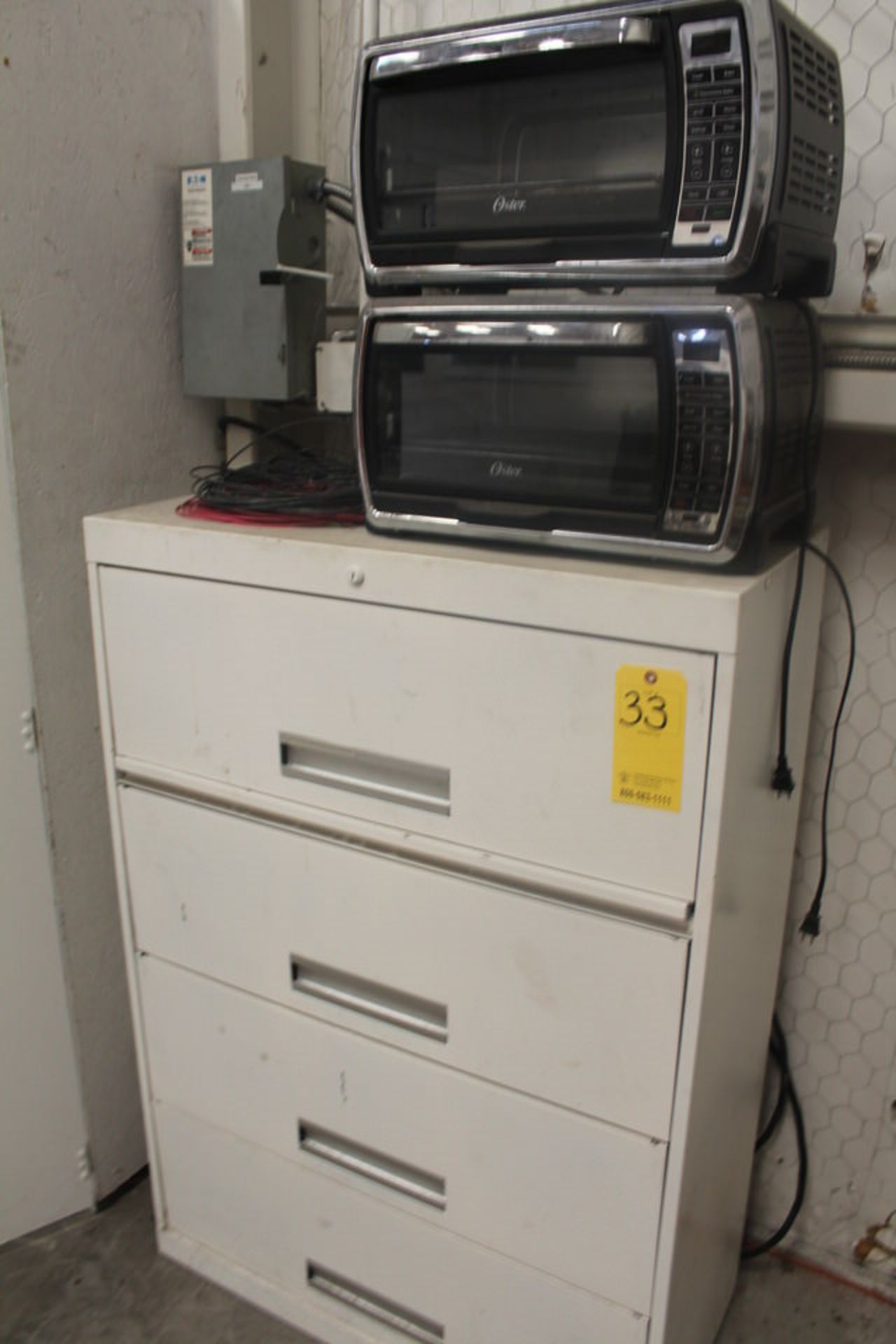 4 DRAWER LAT FILE CABINET W/ 2 OSTER CONVECTION OVENS