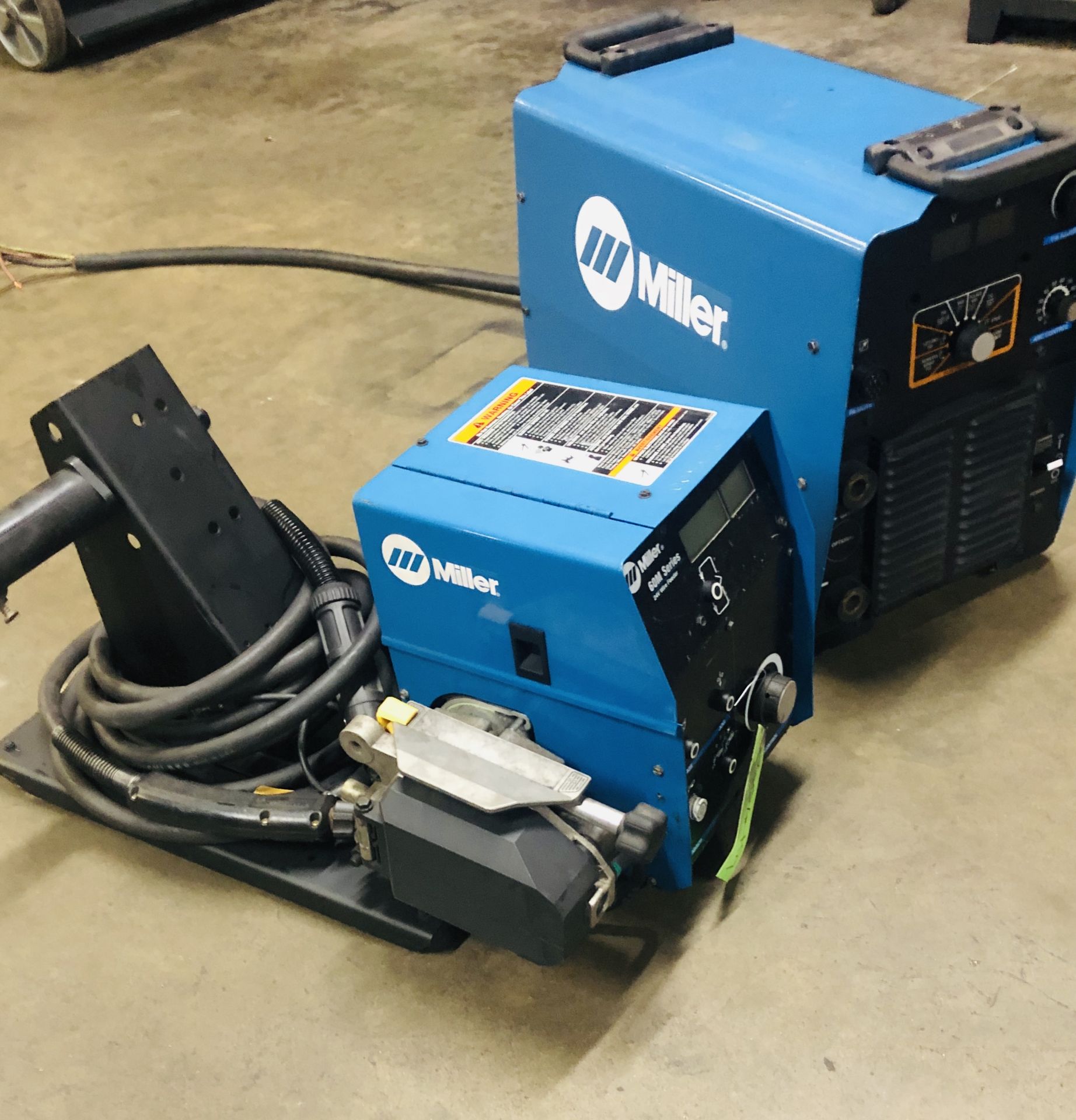 MILLER XMT 350 WELDER W/ 60 M WIRE FEEDER (LOCATION: 4360 COMMERCE CIRCLE, SUITE E, ATLANTA GA 3033