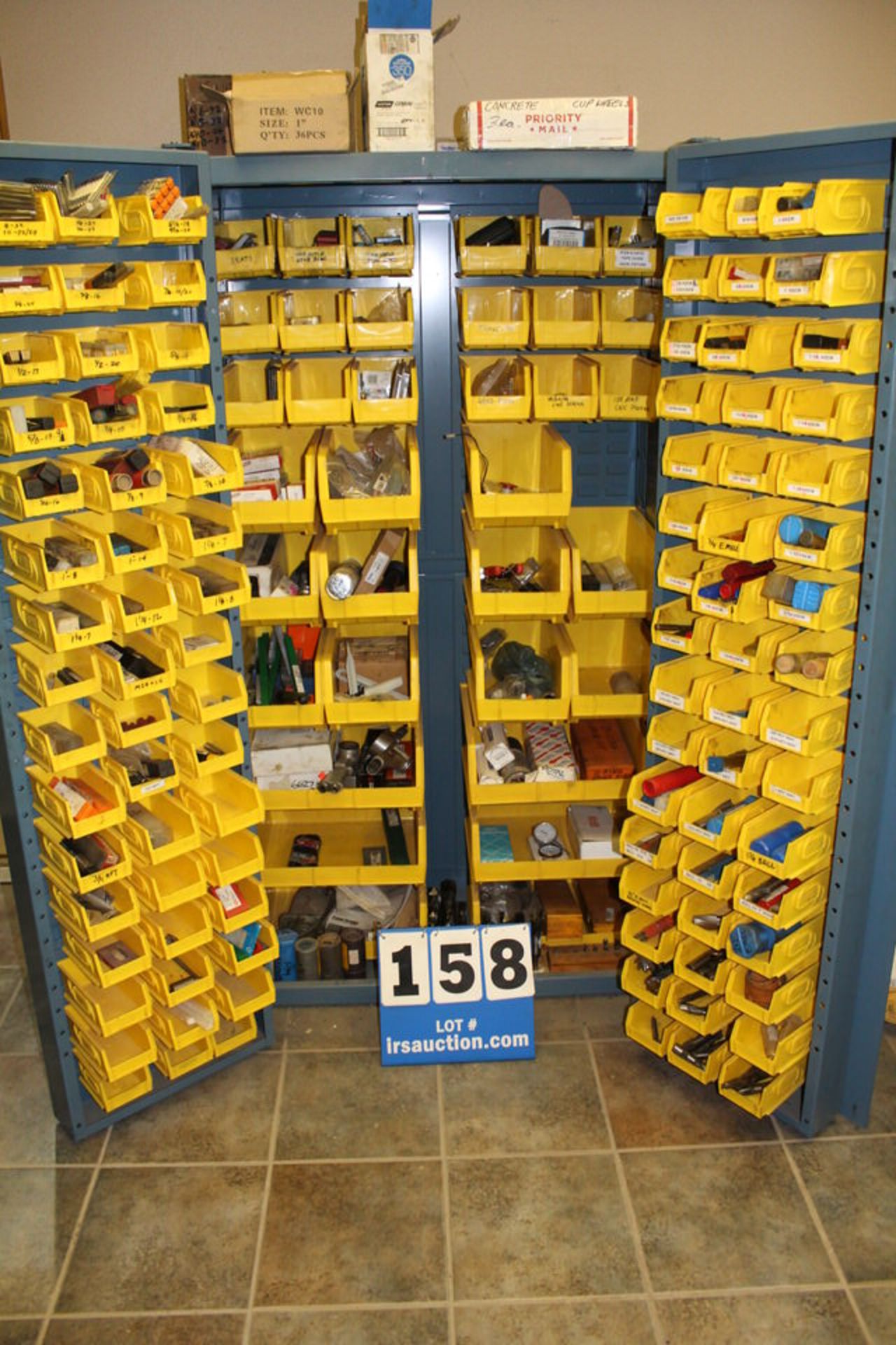 (1) TWO DOOR STORAGE CABINET W/ CONT: ENDMILLS, REAMERS, CARBIDE INSERTS, ASST INSERTS, DRILLS,