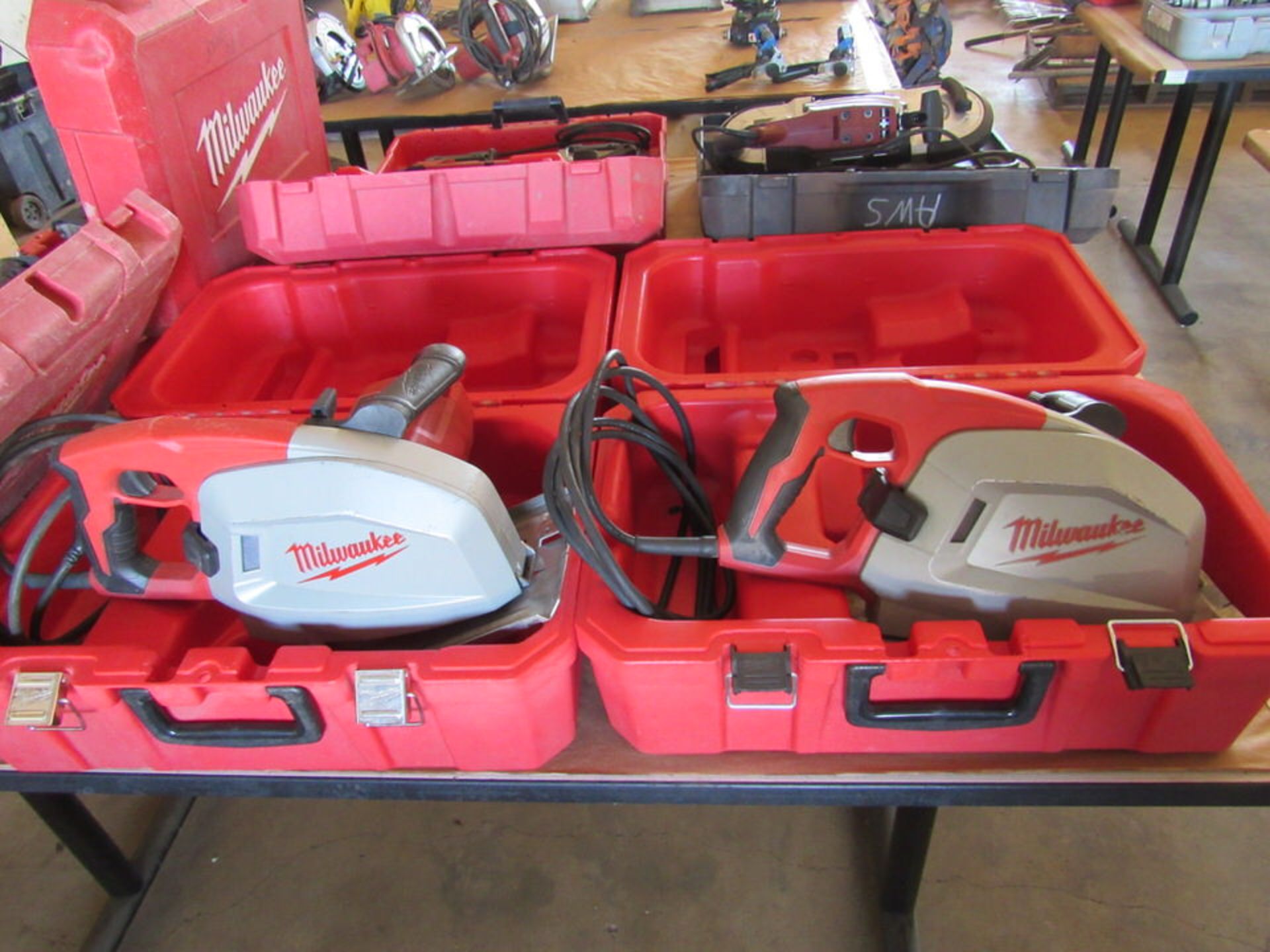 Two Milwaukee Metal Cutting Circular Saws in Cases