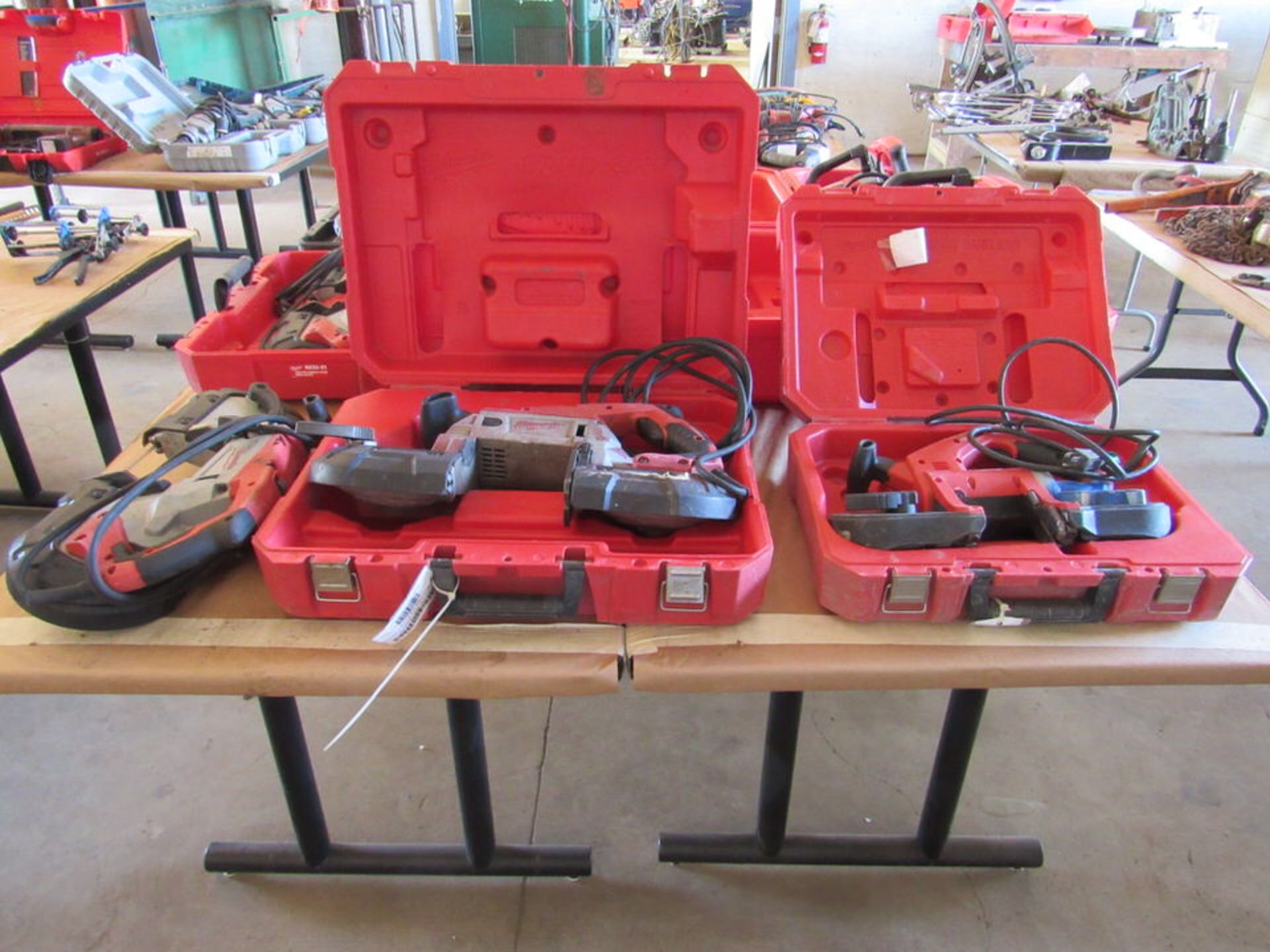 Three Milwaukee Portable Metal Cutting Bandsaws, 2 in Cases