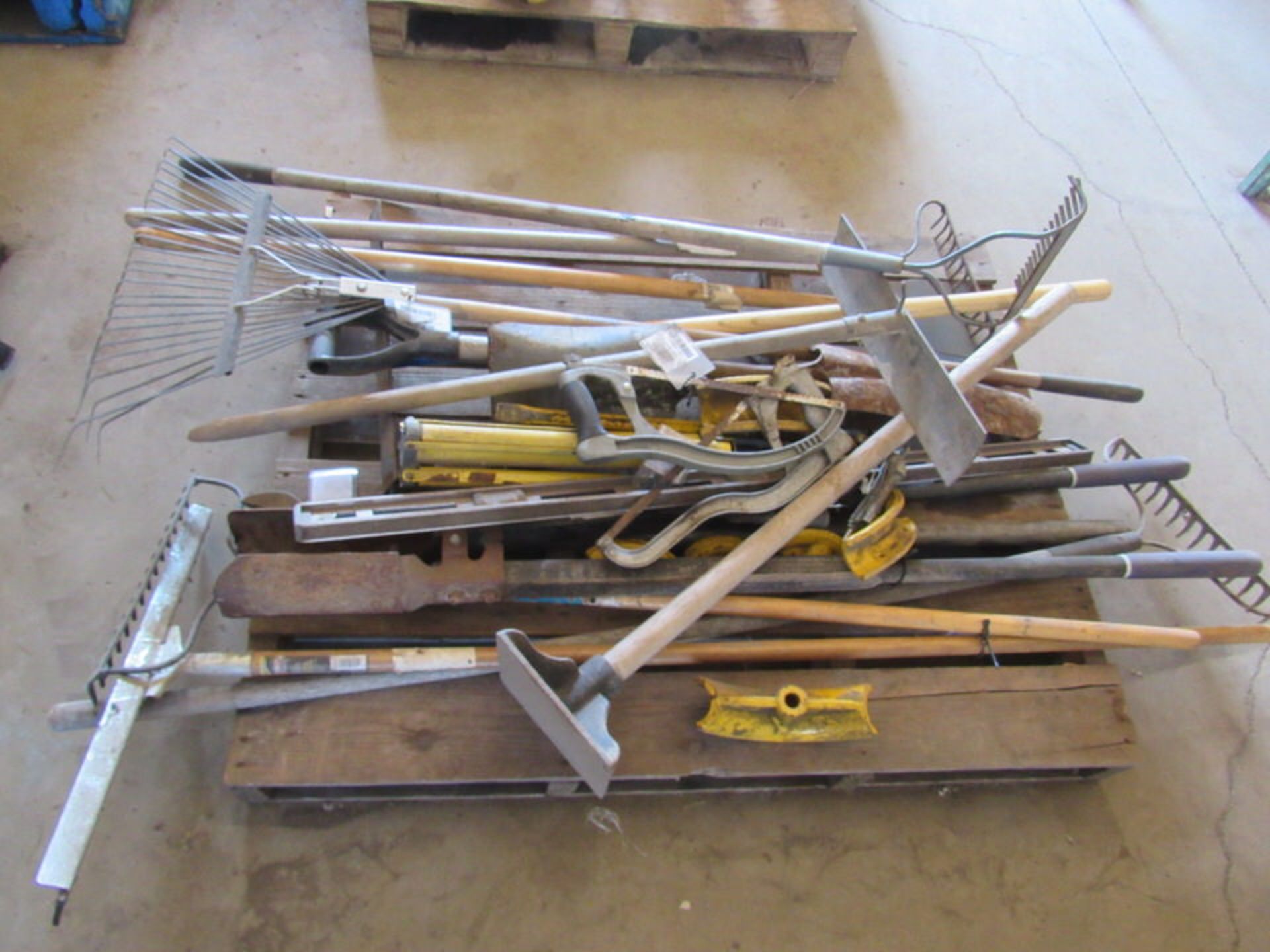 Pallet #1: Lot of Miscellaneous Tools, Rakes, Post Hole Diggers, Level, etc.