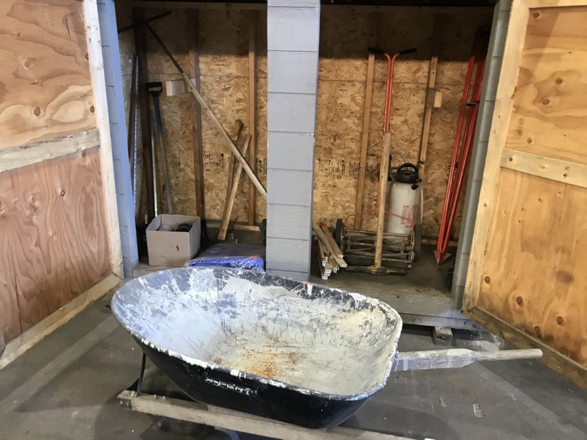 WHEEL BARROW & YARD TOOLS IN SHED