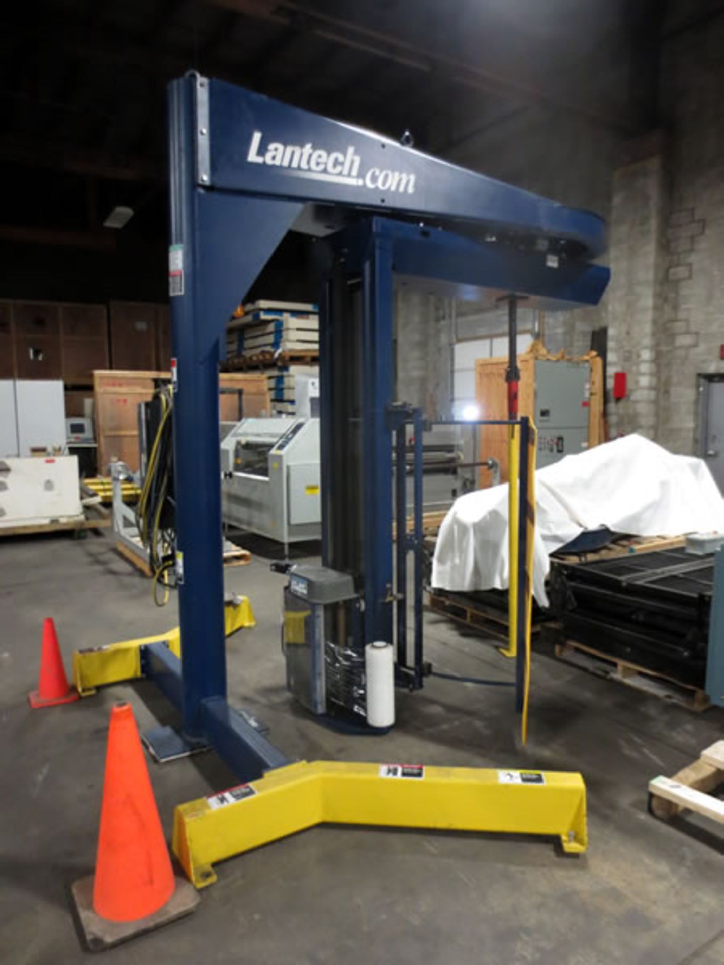 Used Lantech S-300 Straddle Style Semi-Automatic Stretch Wrapper