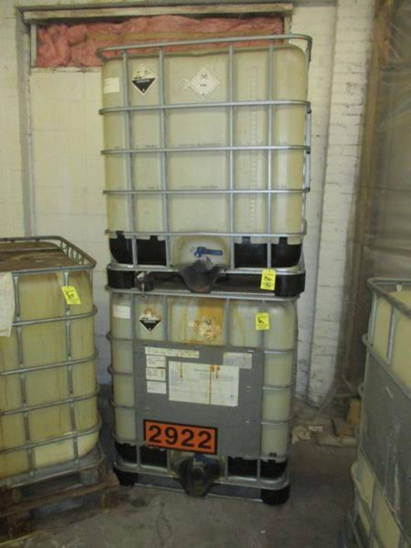 LOT (2) Approx. 275 Gallon Palletized Steel Bound Plastic Tanks