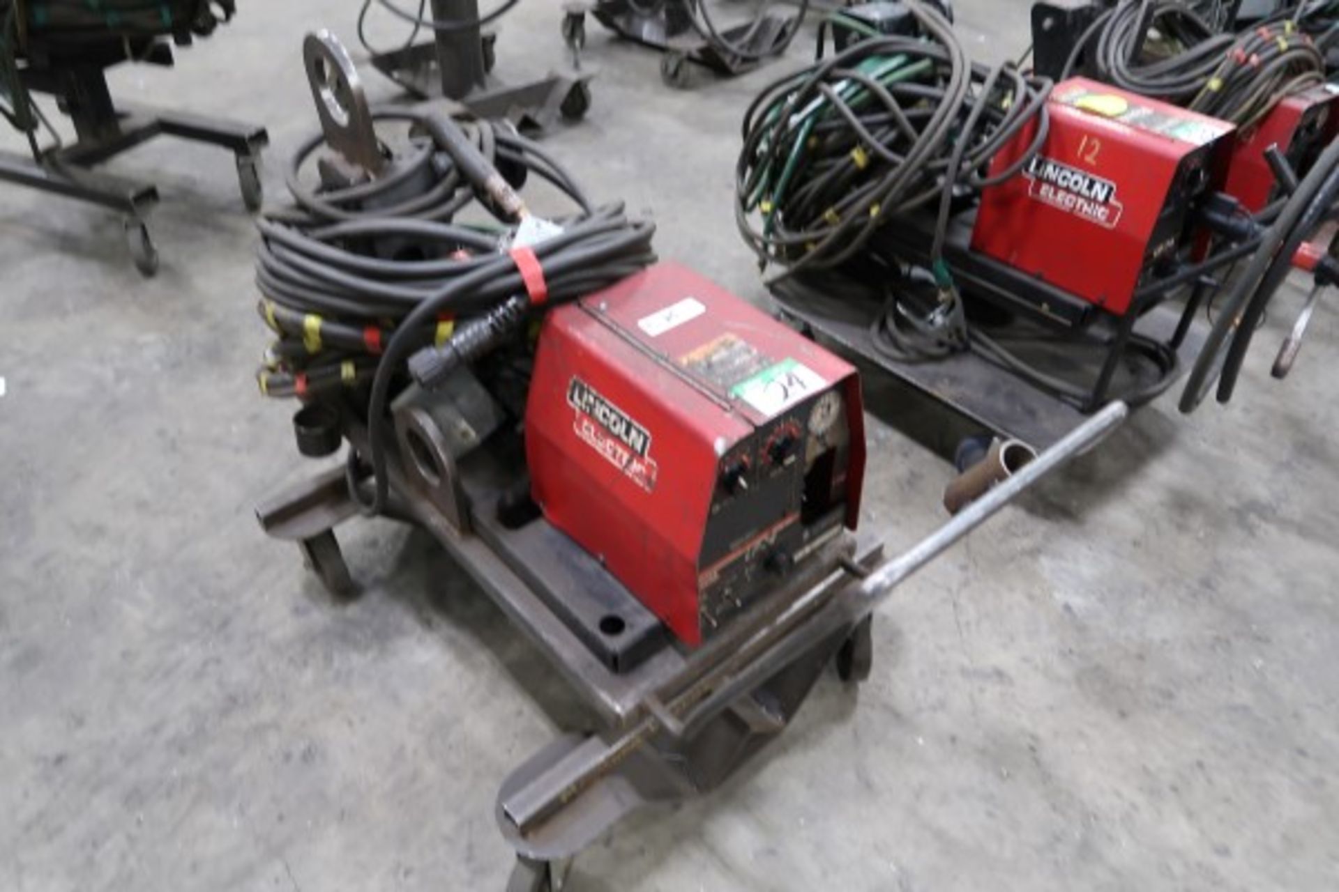 LINCOLN LF-74 WIRE FEEDER ON CART