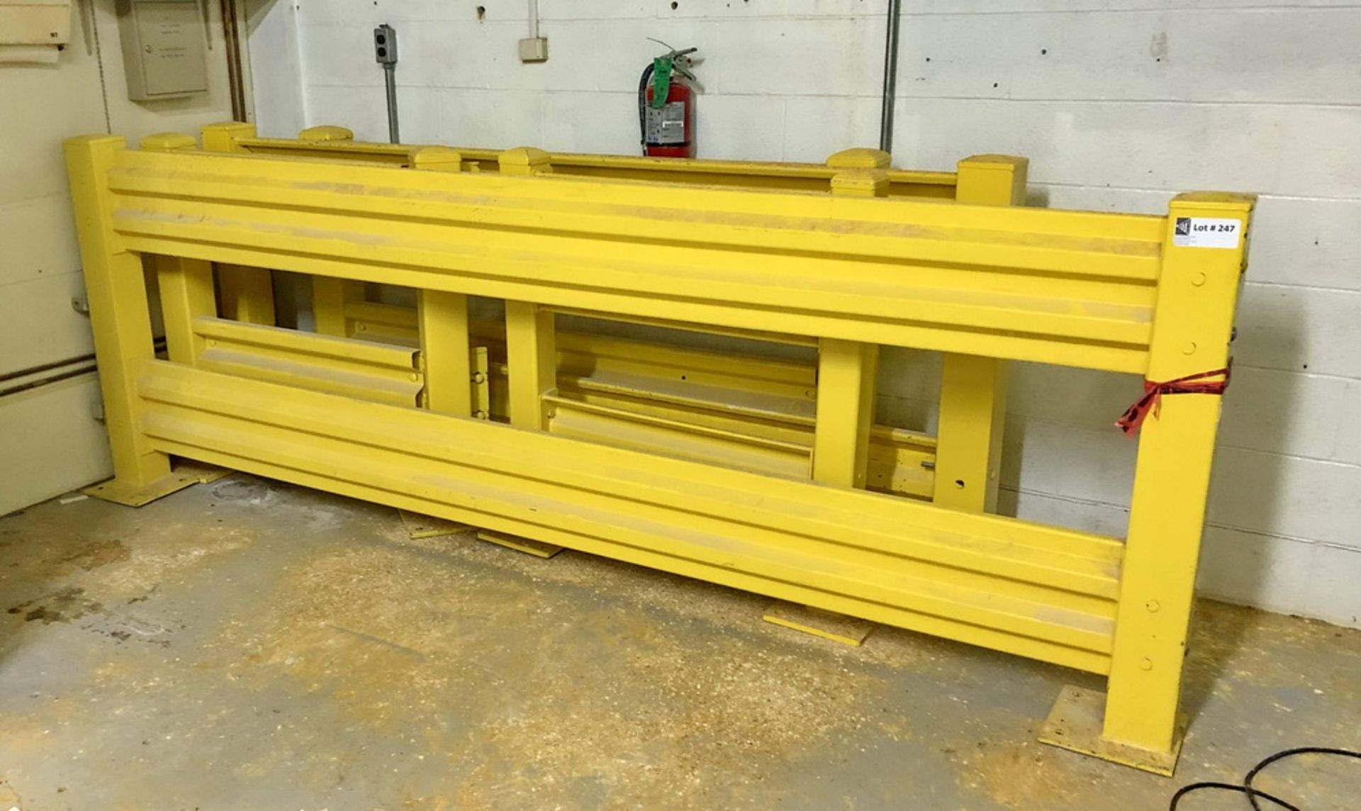 Lot of yellow steel wall protection guard rails, will require a full trailer