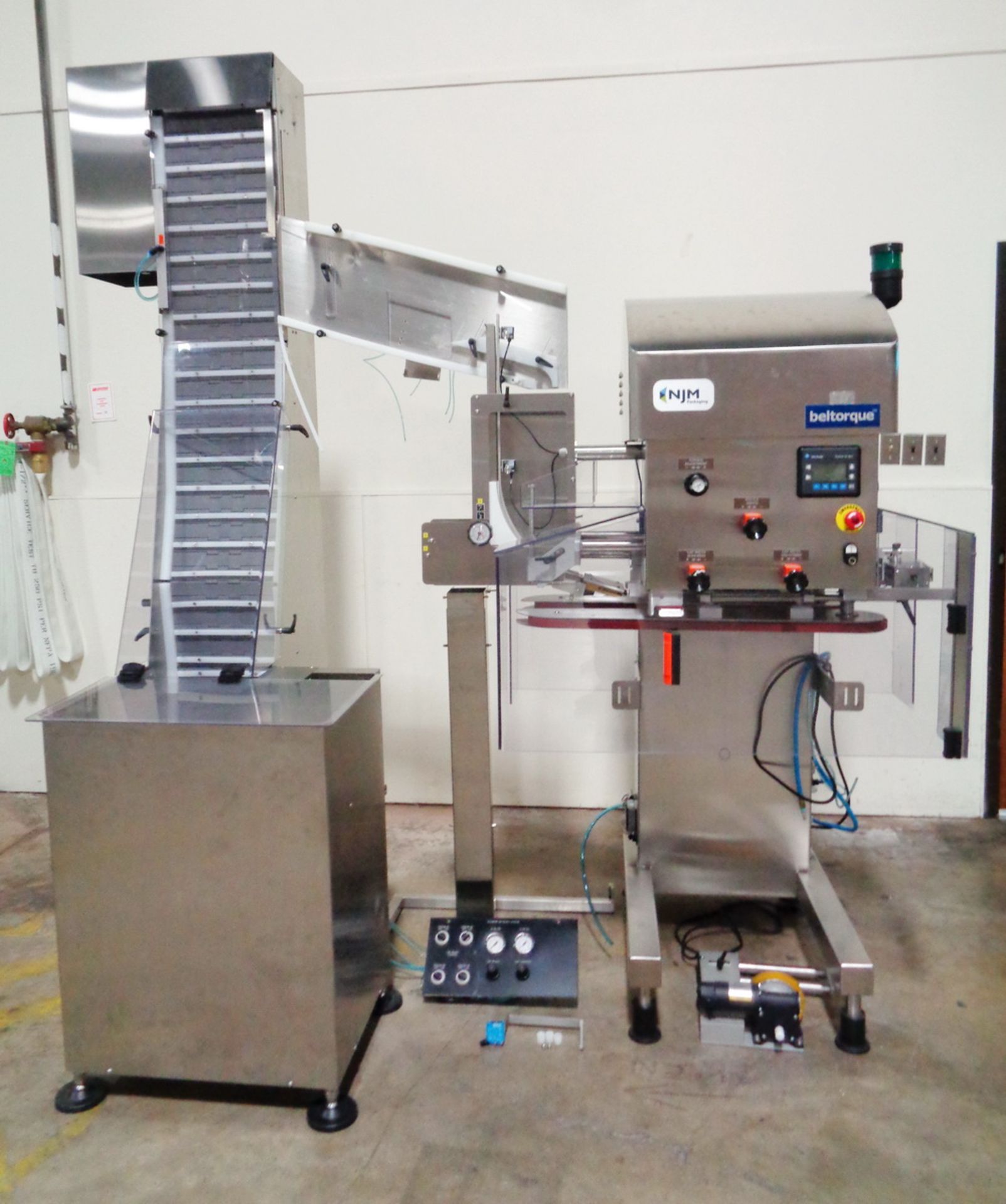 NJM Packaging Beltorque High Speed In-Line Synchronized Belt Type Capper, Model BT-IC