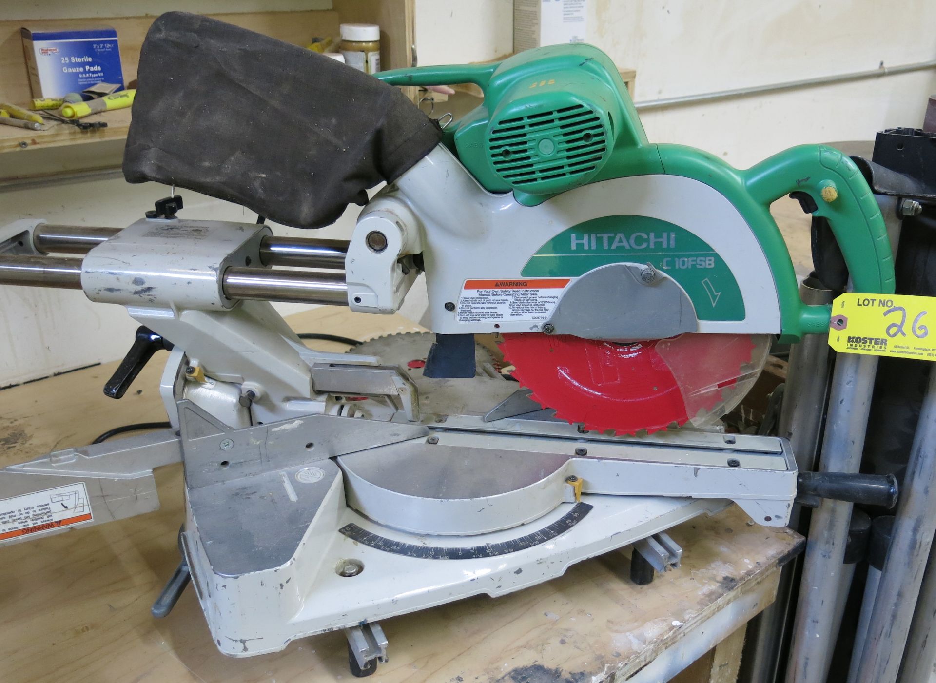 (1) HITACHI MDL. C10FSB 10" COMPOUND MITER SAW WITH HITACHI MDL. UU 610 UNIVERSAL WORK STATION