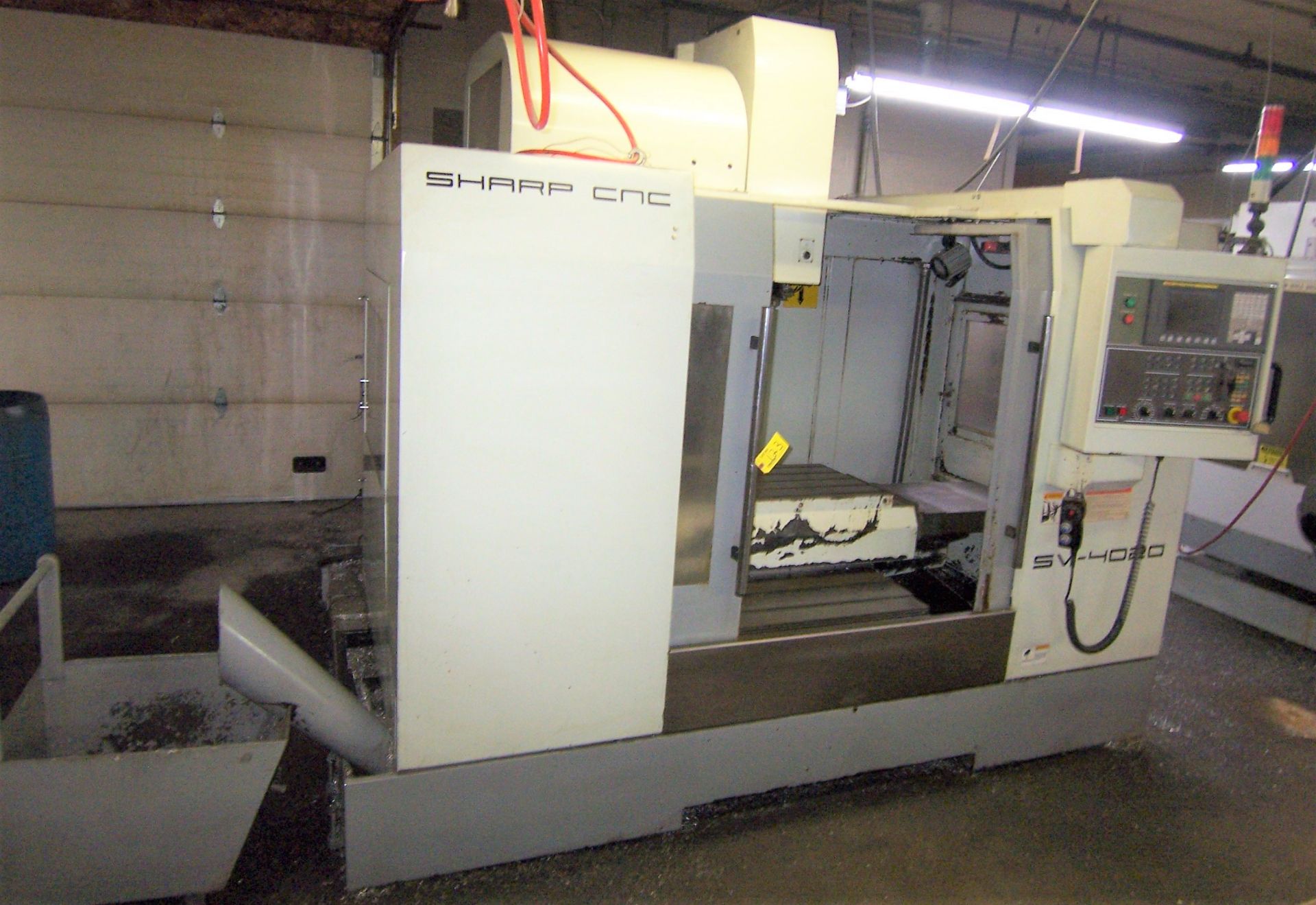 SHARP MDL. SV4020 CNC VERTICAL MACHINING CENTER WITH 20" X 45-1/2" TEE SLOTTED TABLE, 24-POSITION