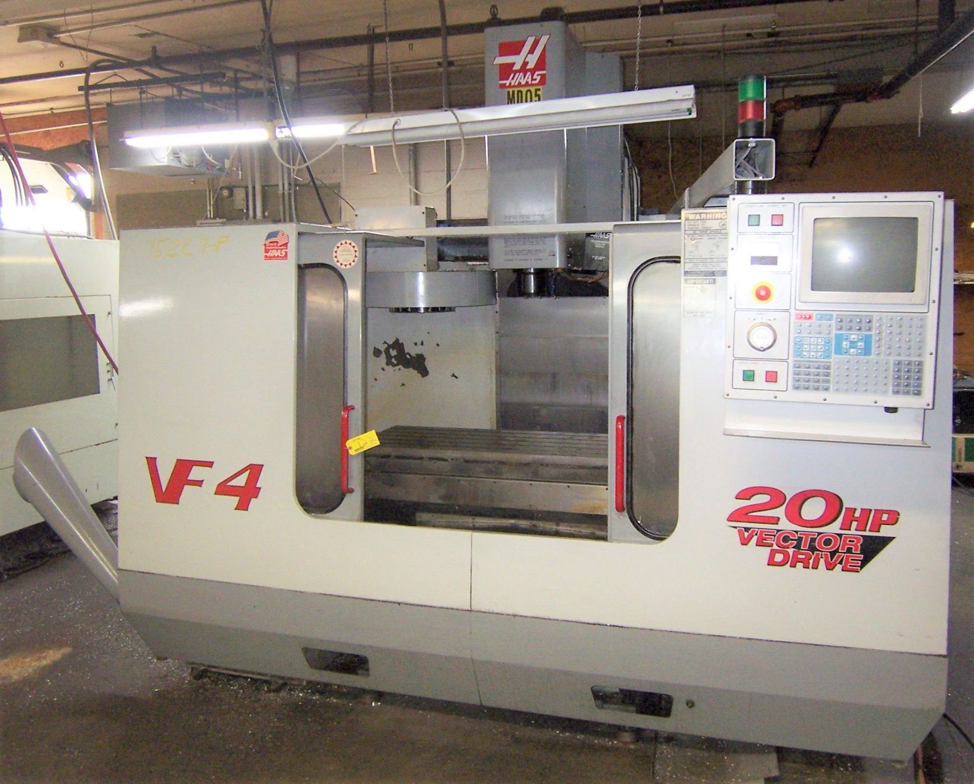 HAAS MDL. VF4 CNC VERTICAL MACHINING CENTER WITH 20-POSITION AUTOMATIC TOOL CHANGER, 20 HP VECTOR