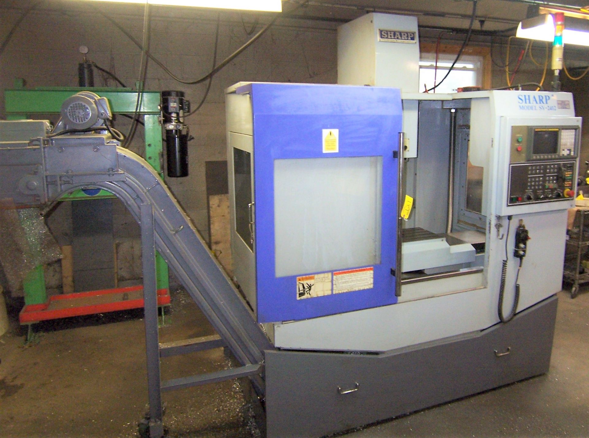 SHARP MDL. SV24125 CNC VERTICAL MACHINING CENTER WITH 16-POSITION AUTOMATIC TOOL CHANGER, 12" X 27-