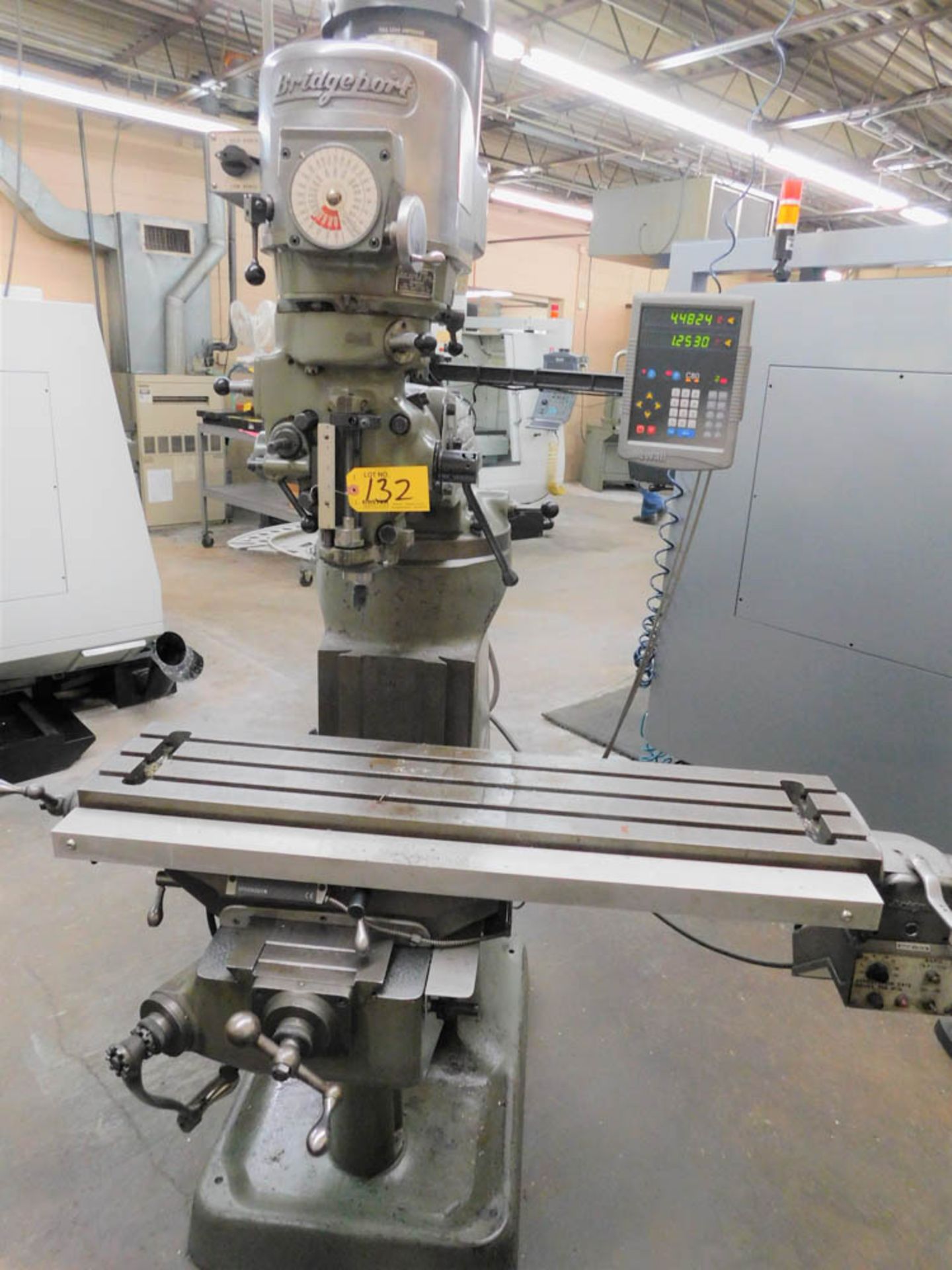 BRIDGEPORT 2HP KNEE TYPE VERTICAL MILLING MACHINE, NEWALL 2HP DIGITAL READOUT, 60-4200 RPM, 9" X 42"