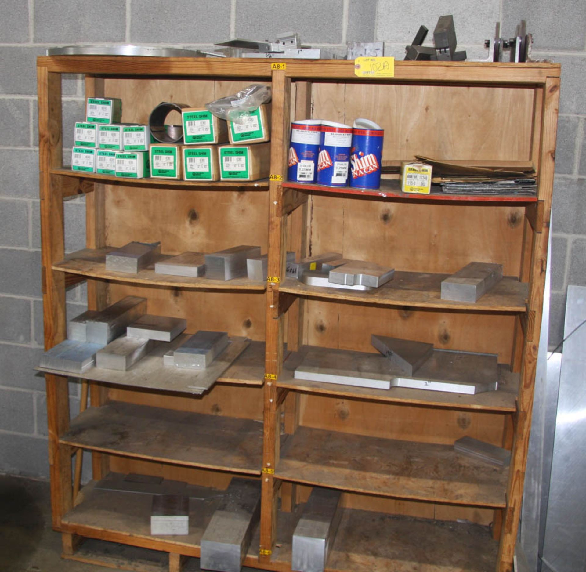 WOOD RACK WITH ALUMINUM, BILLETS, ALUMINUM FLAT BAR, STEEL BAR, ASSORTED STEEL & STAINLESS STEEL