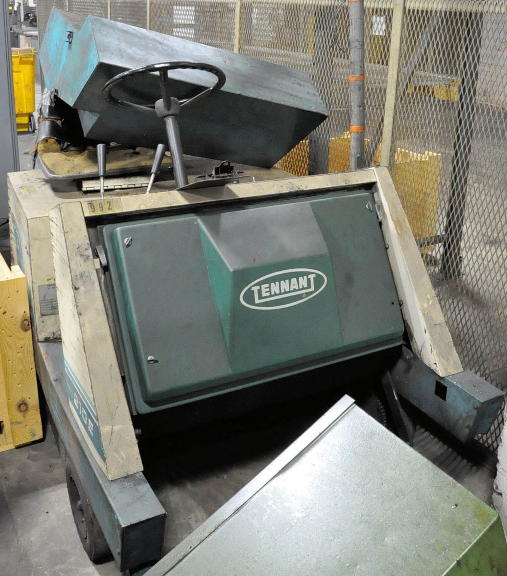 TENNANT MDL. 210E, ELECTRIC SIT DOWN RIDE ON FLOOR SWEEPER, S/N: N/A, (STORAGE AISLE-TIFFIN)