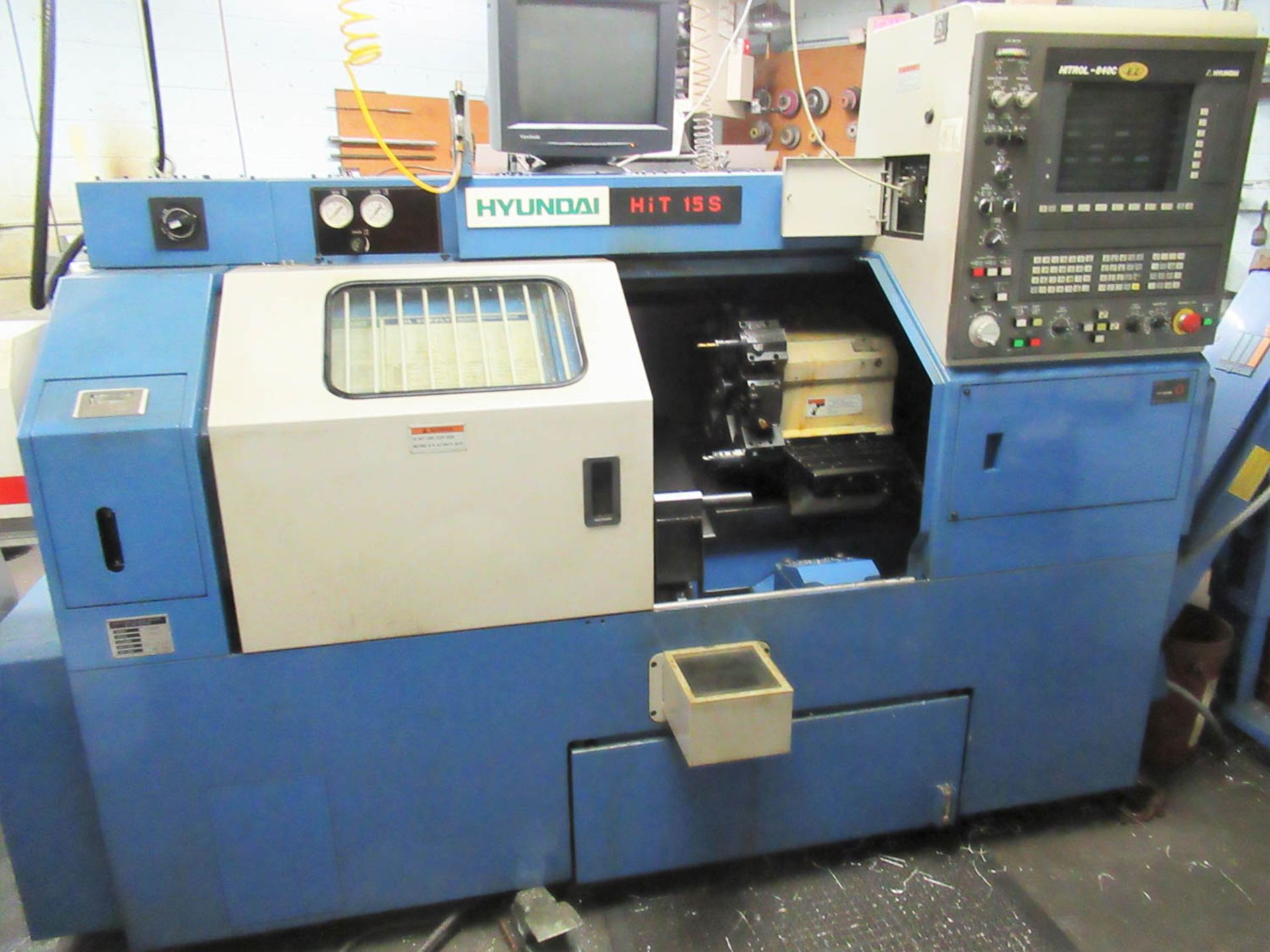 HYUNDAI MDL. HIT-15S CNC CHUCKER, WITH 8-POSITION TURRET, TOOL PRESETTER, 8" KITAGAWA CHUCK,