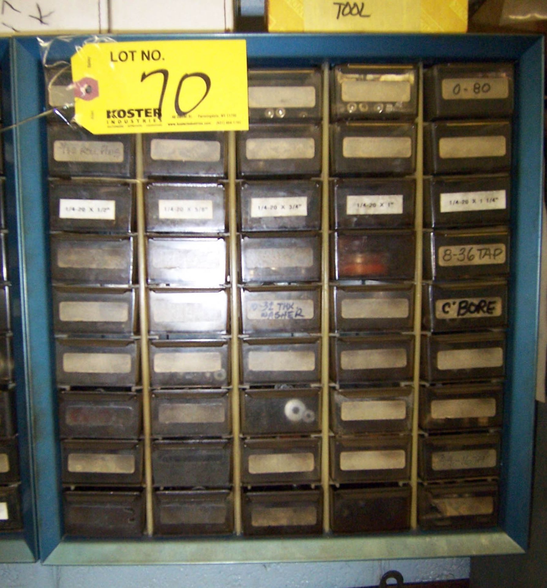 PARTS CABINET WITH ASSORTED TAPS