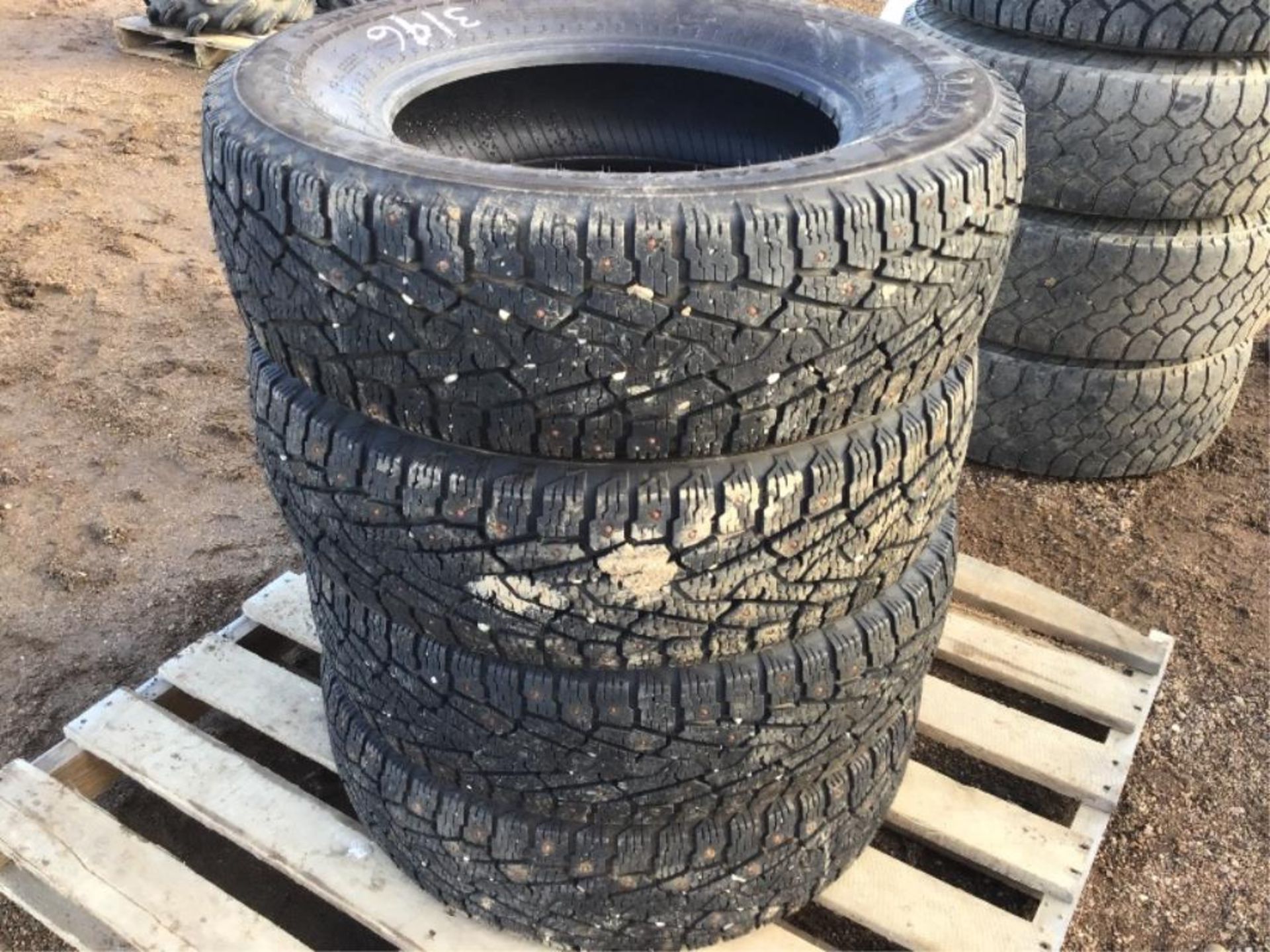 Set of (4) LT245/70R17 Studded Tires