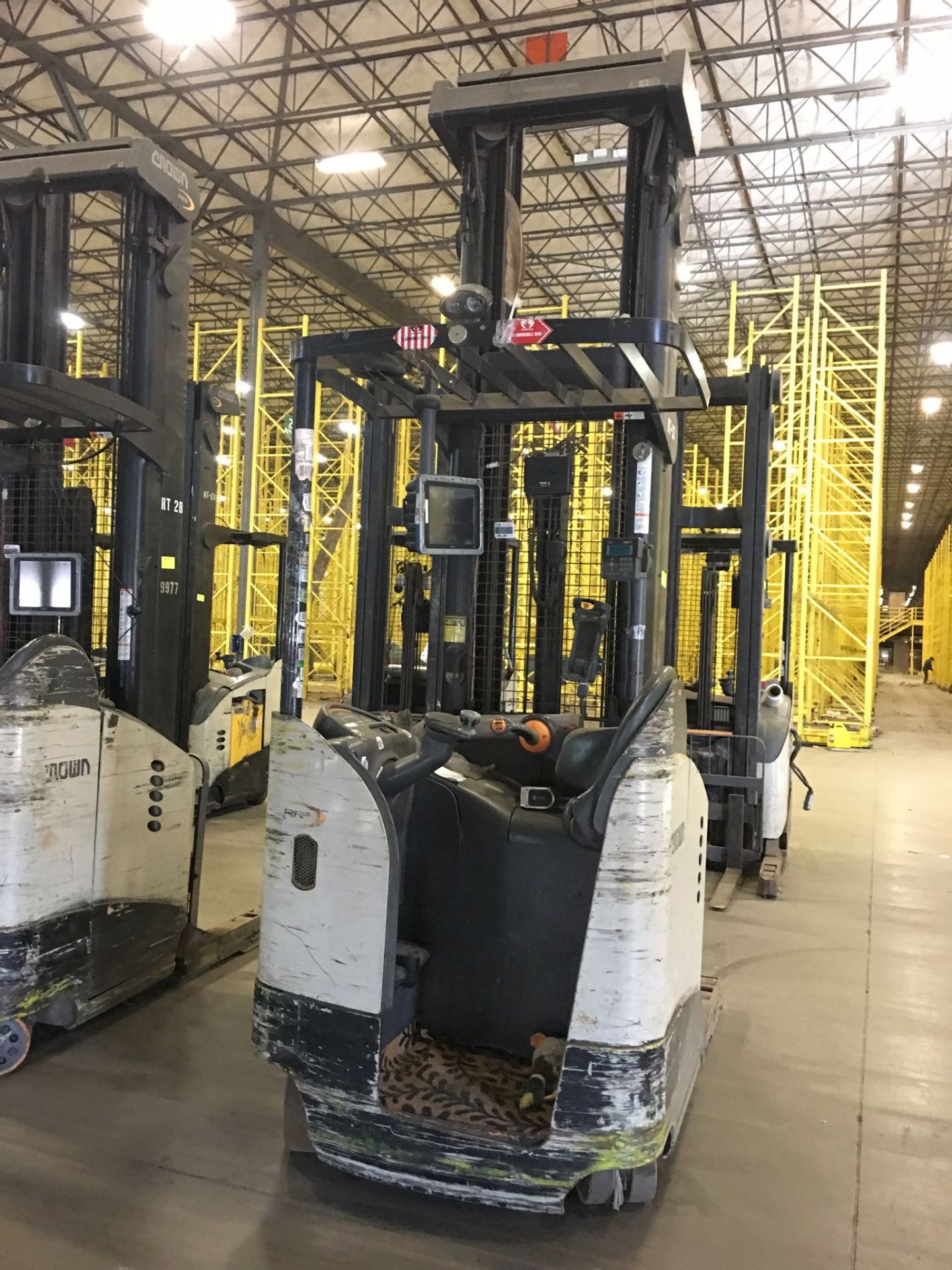 CROWN REACH TRUCK. Model #: RR5700. S/N: 1A433675. Hours (as of Oct 15, 2018): 959. Year: 2015. Mast